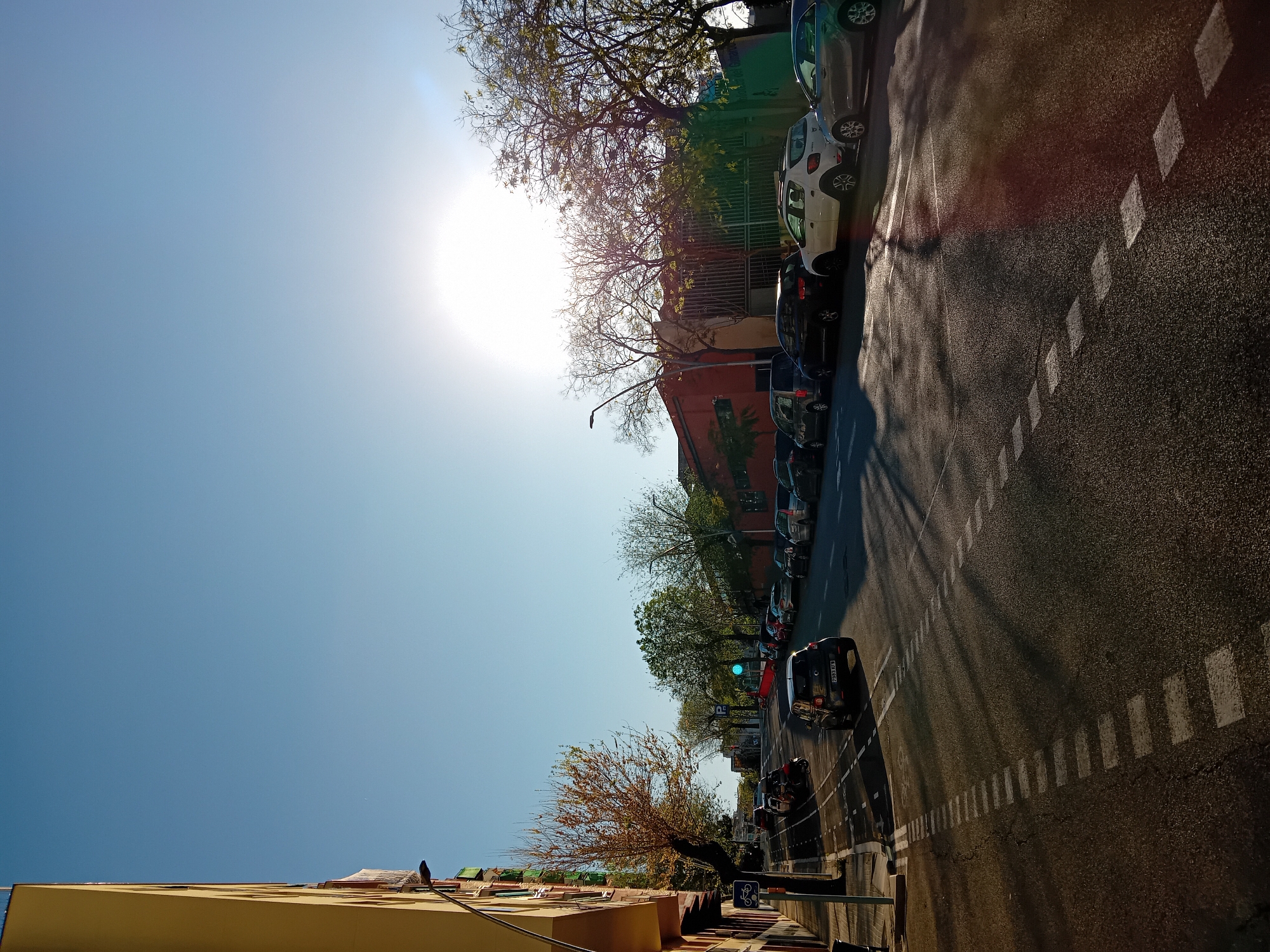 Morning moments captured in Barcelona: sunny streets, rumpled bedding