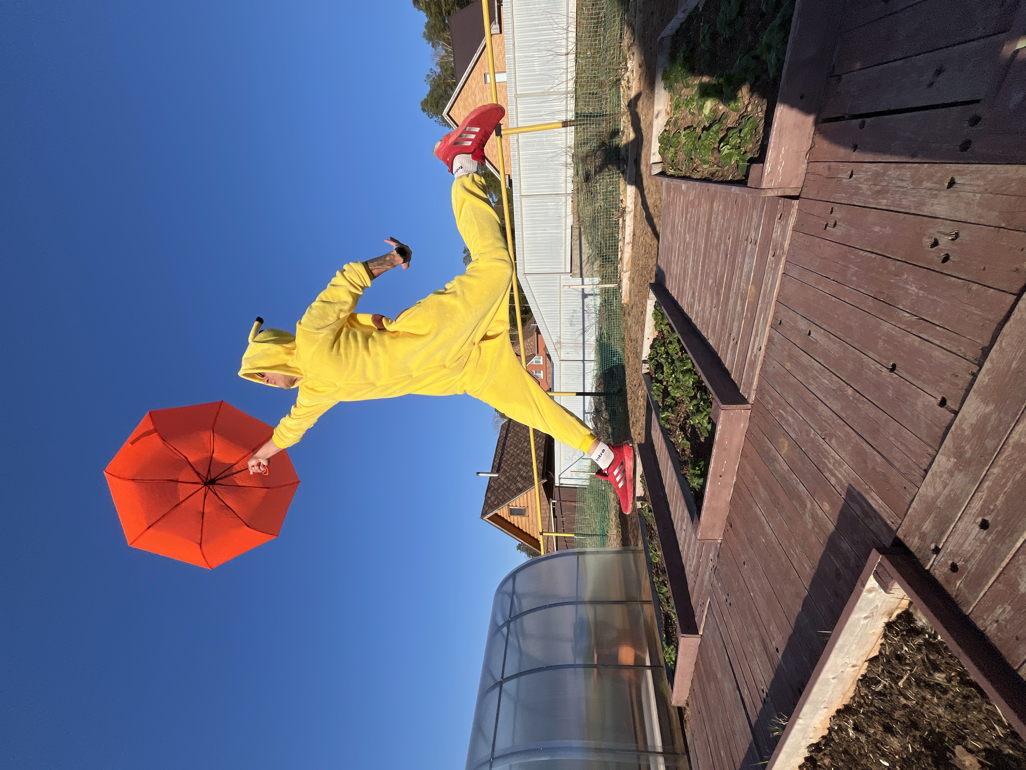 Pikachu-clad person photographed floating with umbrella in Russia