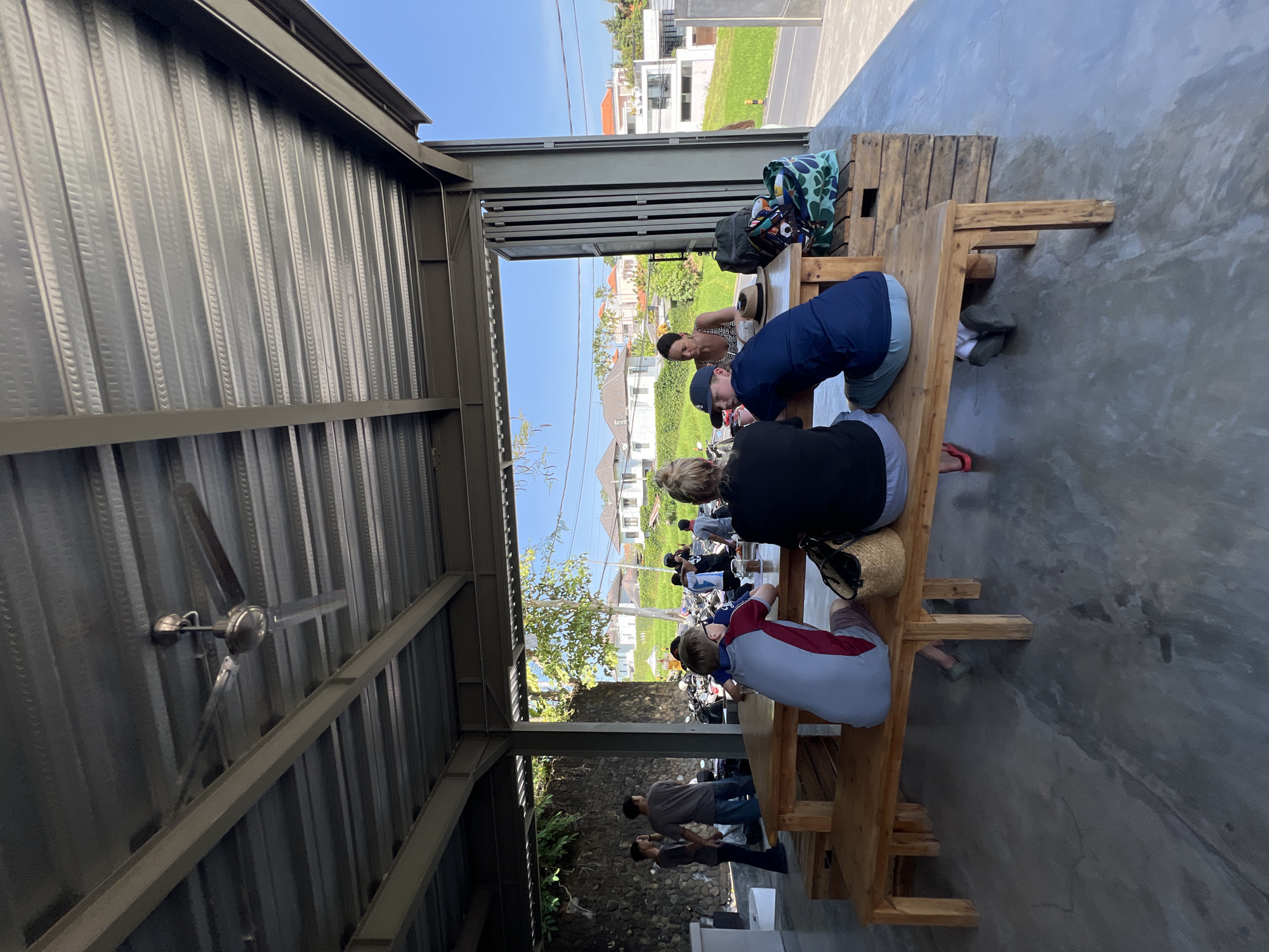 Morning hangout at a Mengwi cafe, streets full of scooters