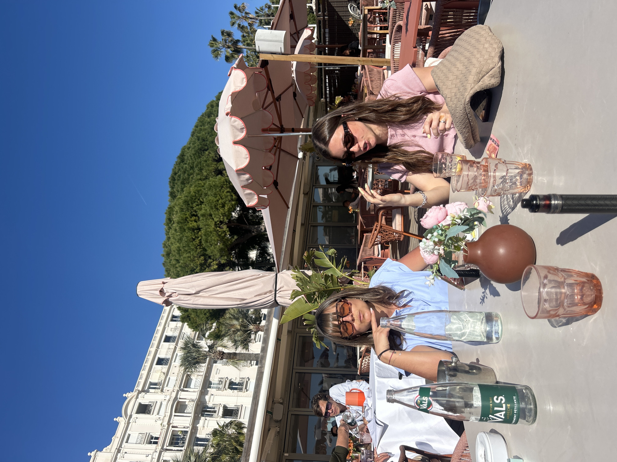 Woman photographed dining at seaside restaurant in Cannes