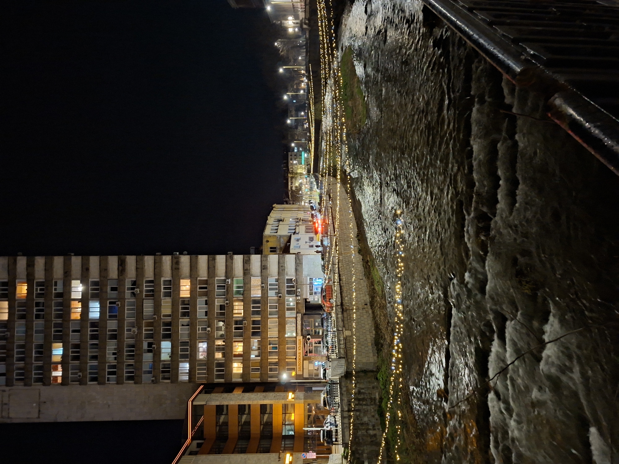 Evening documentation captures Gabrovo's lit waterfront and architectural details