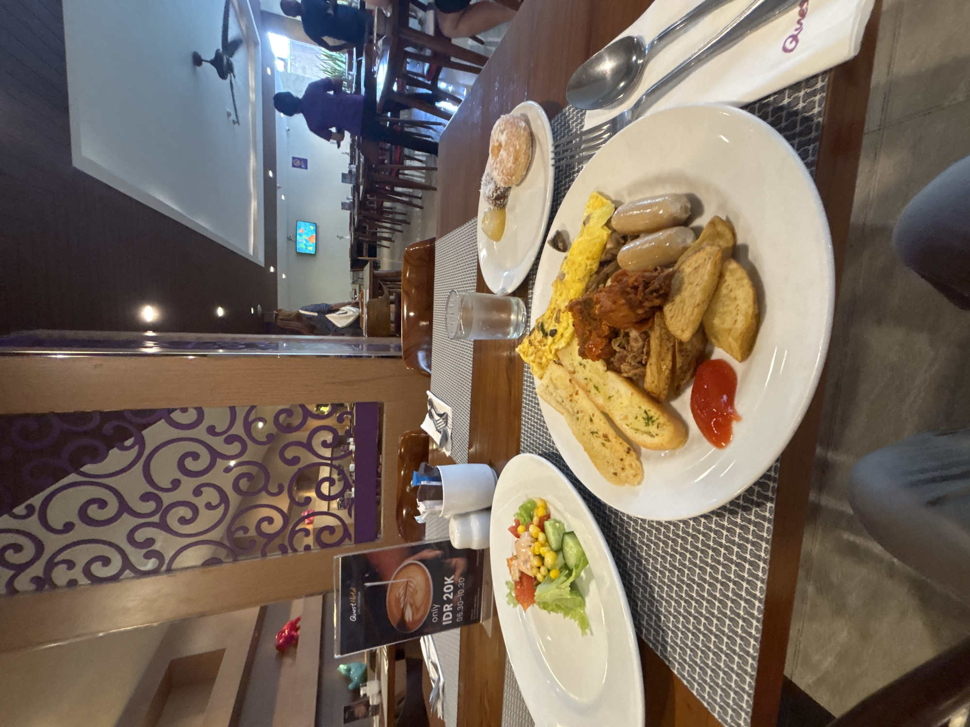 Hotel breakfast buffet at Quest Denpasar, Bali
