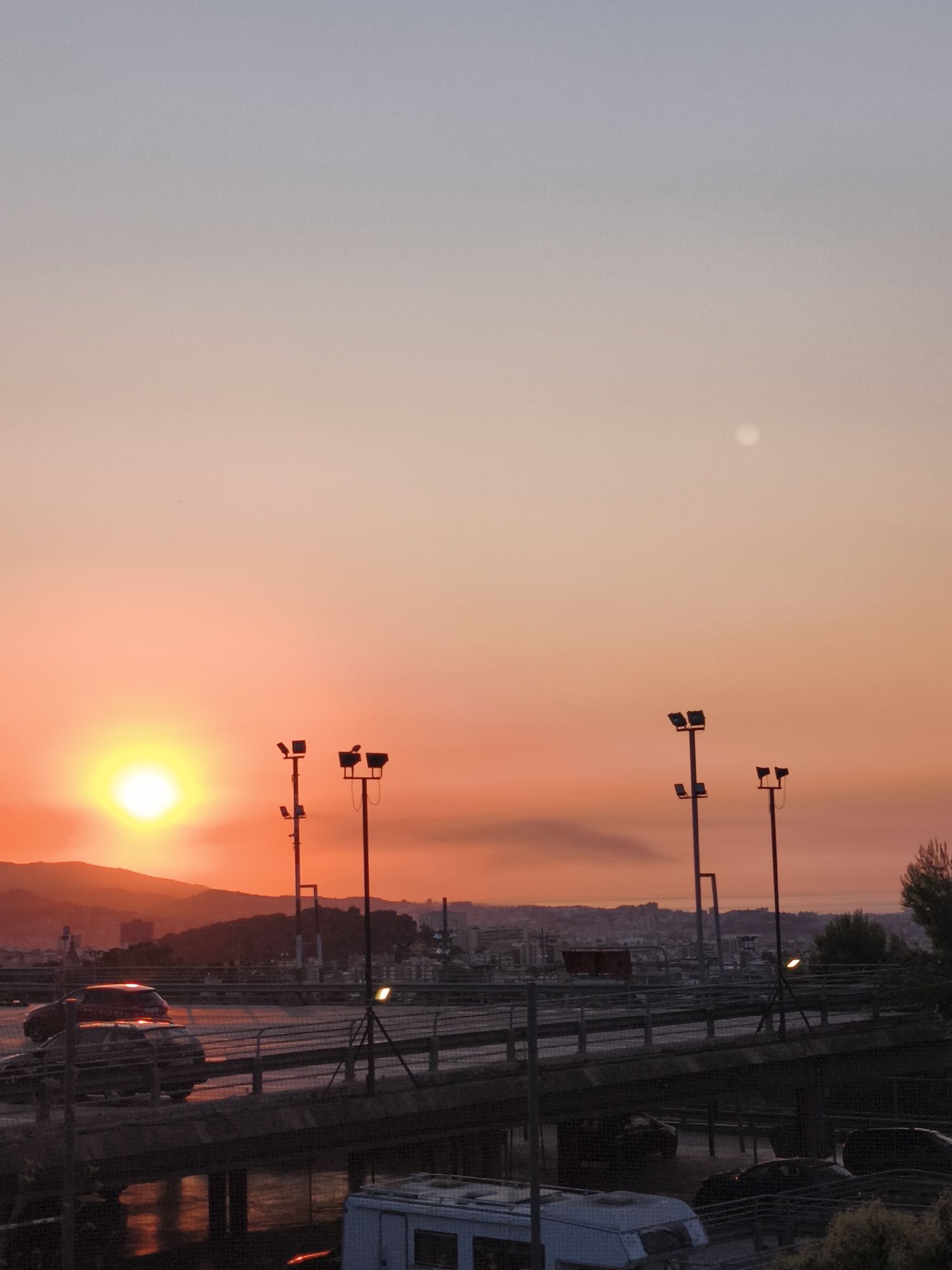 Barcelona sunset, street level, warm golden hour light