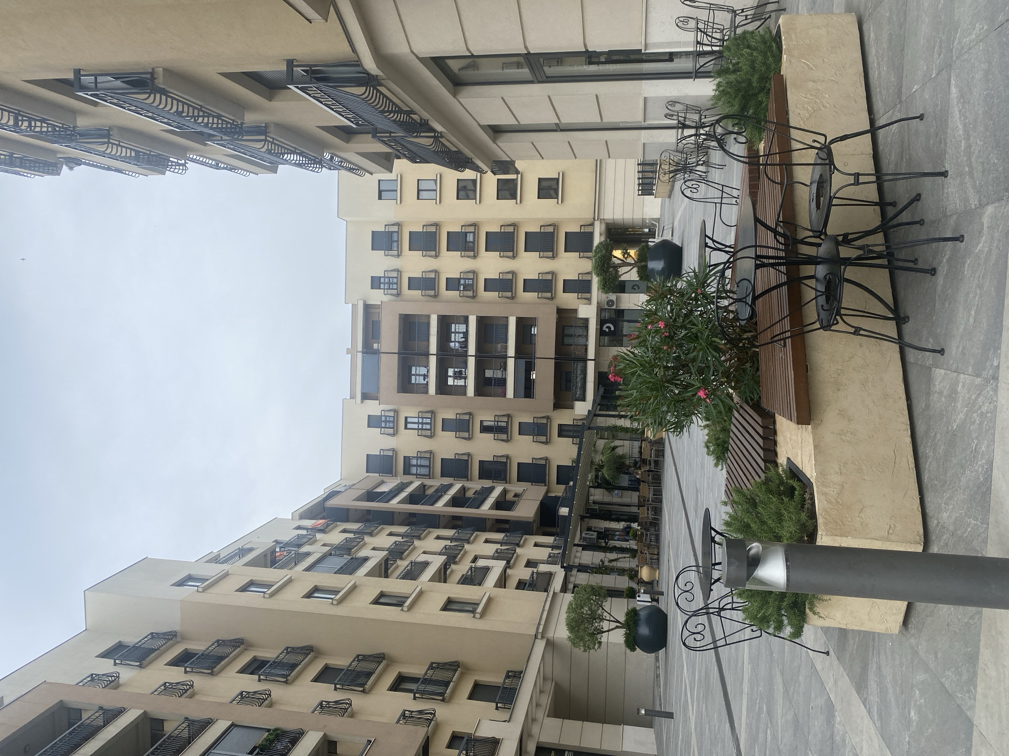 Cafe terrace nestled in a modern Podgorica courtyard