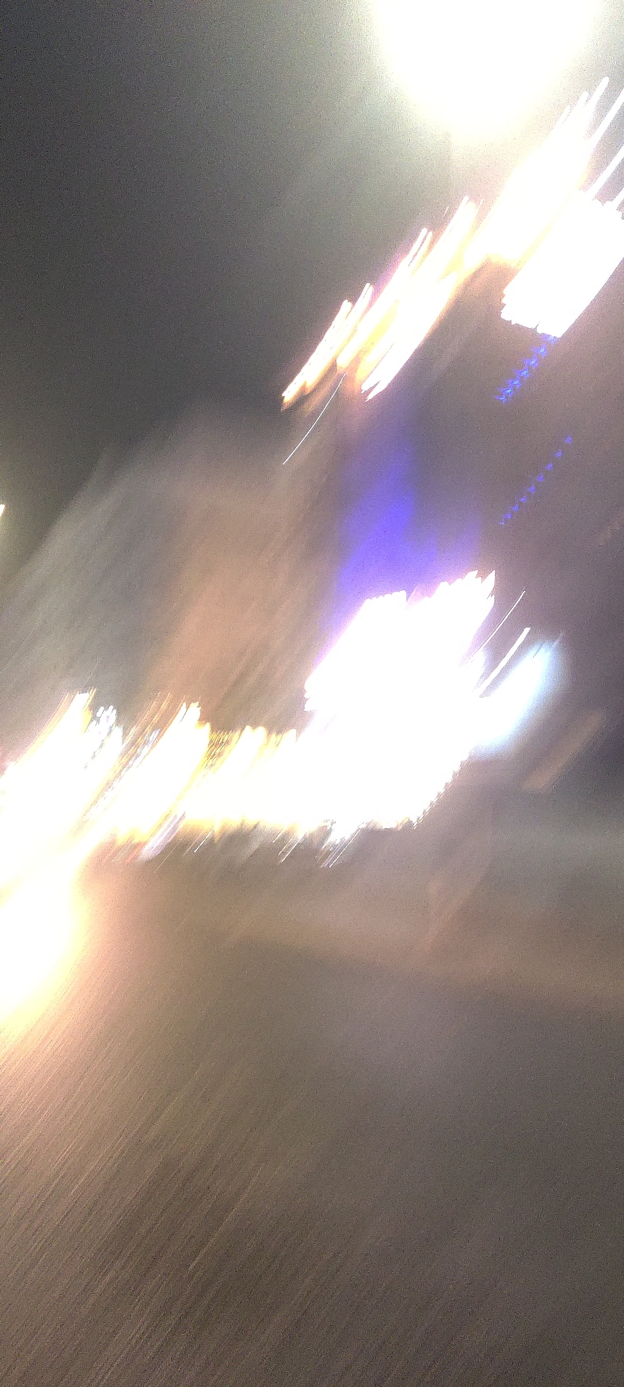 Nighttime street scenes documented across Jeddah commercial district