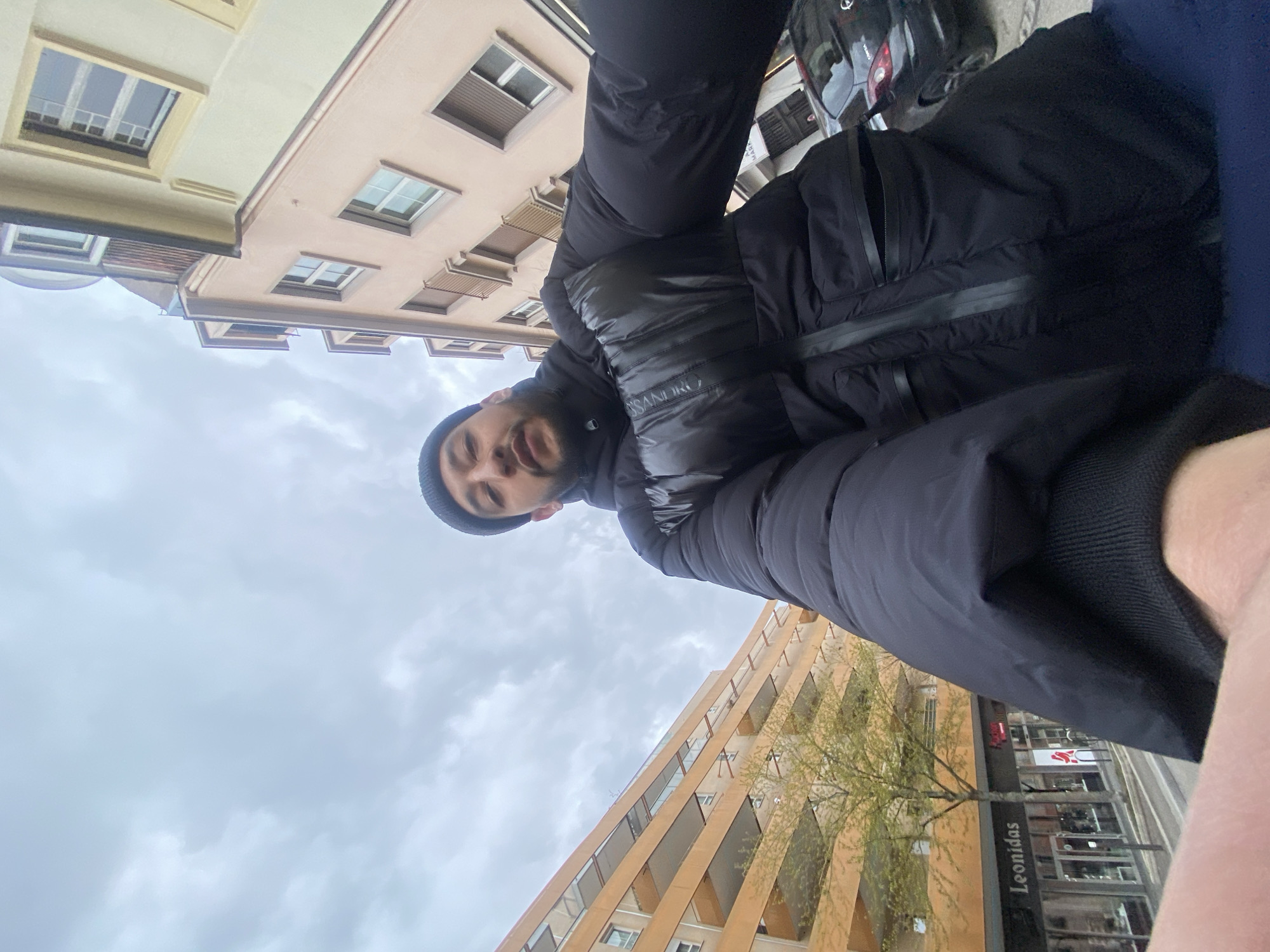 Man photographed on overcast street in Schiltigheim, France