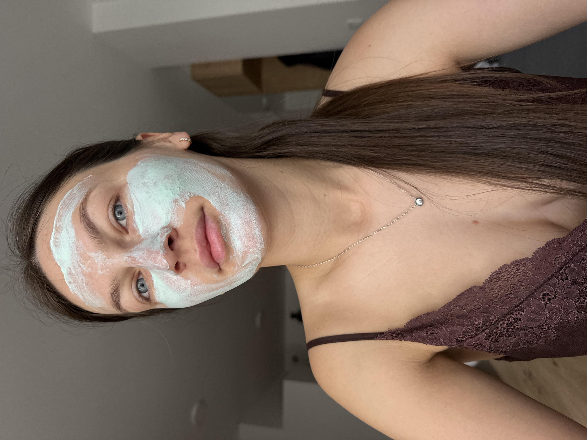 Woman documents morning beauty routine in Budva apartment