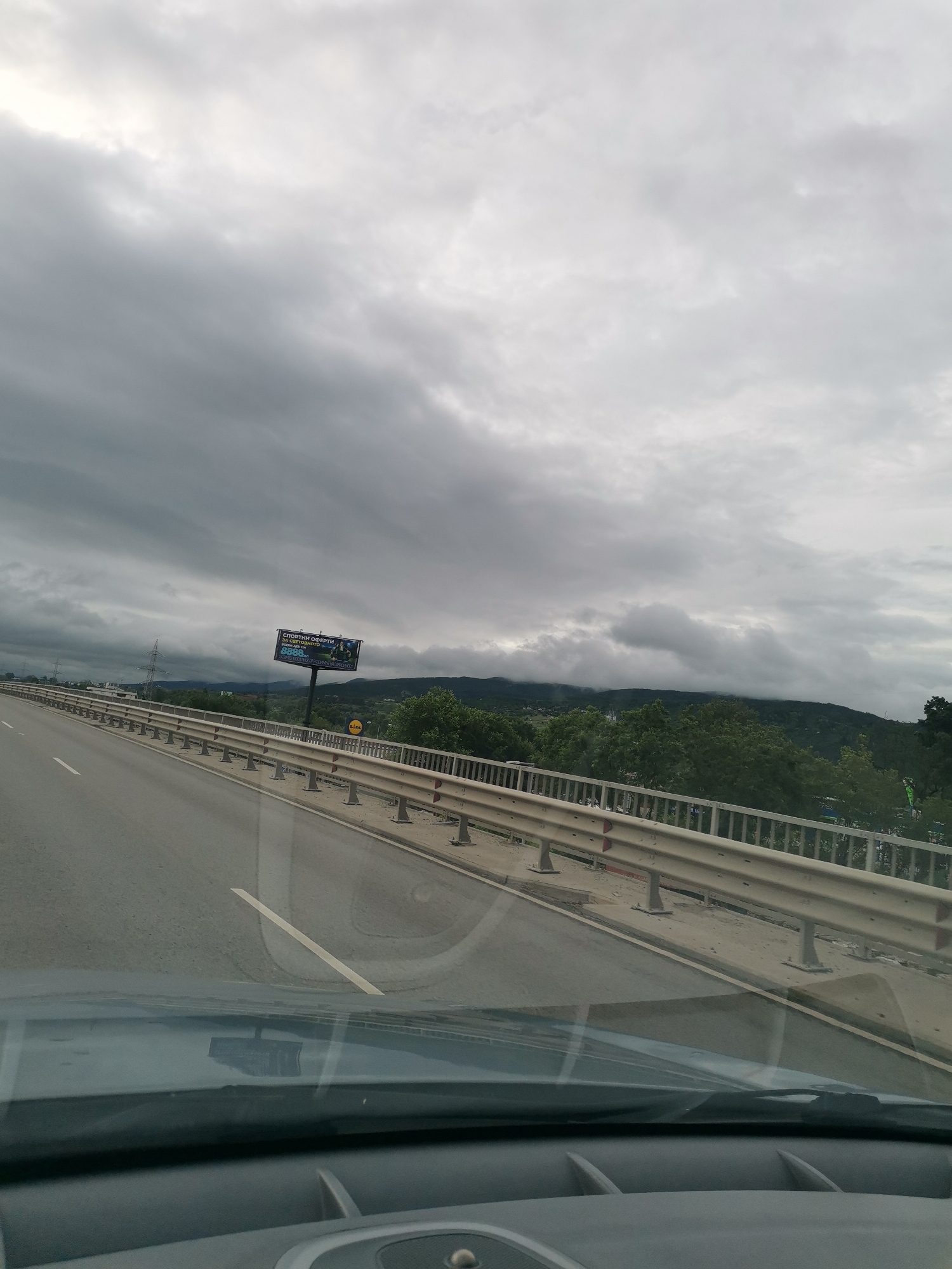 Early morning highway travel captured in Pancharevo, Bulgaria
