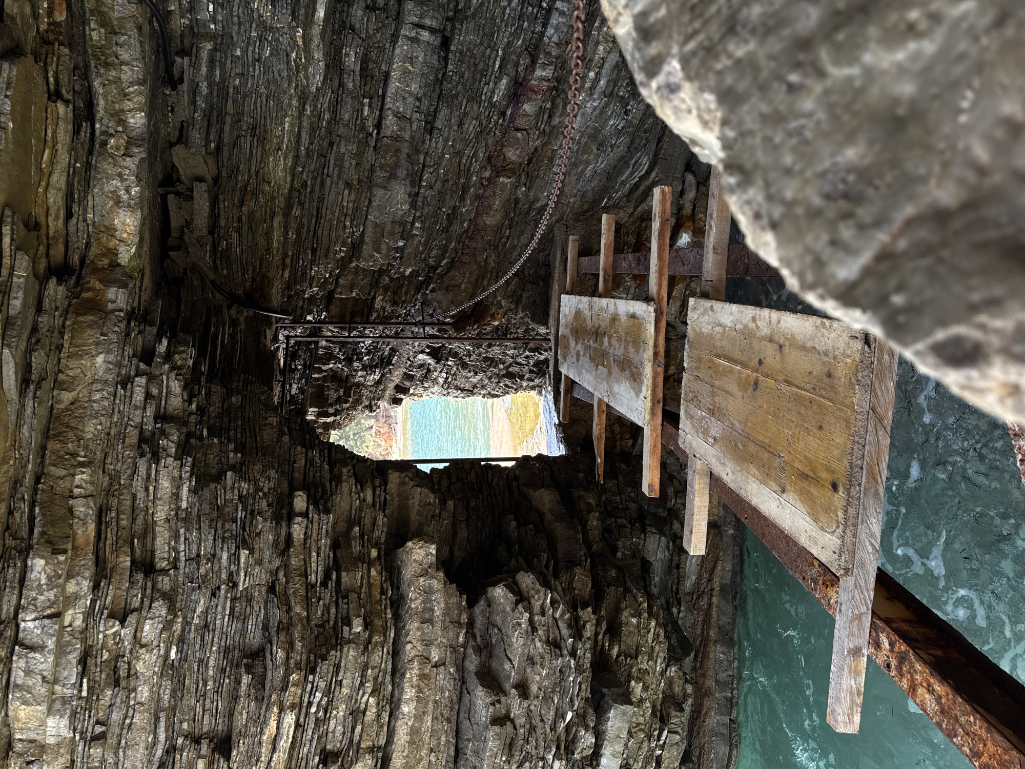 Cave interior with wooden walkway documented in Budva, Montenegro