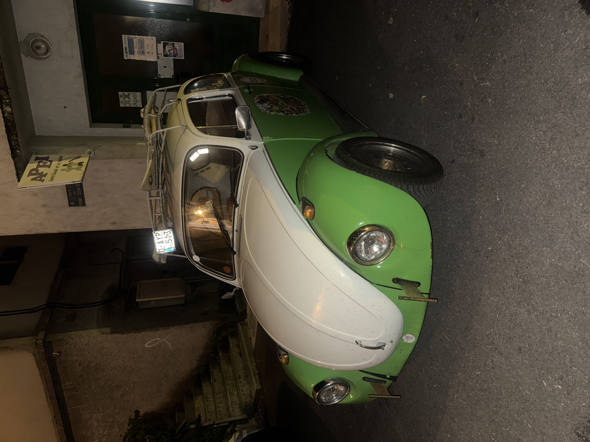 Summer night out in Saint-Claude, VW Beetle and bar terrace