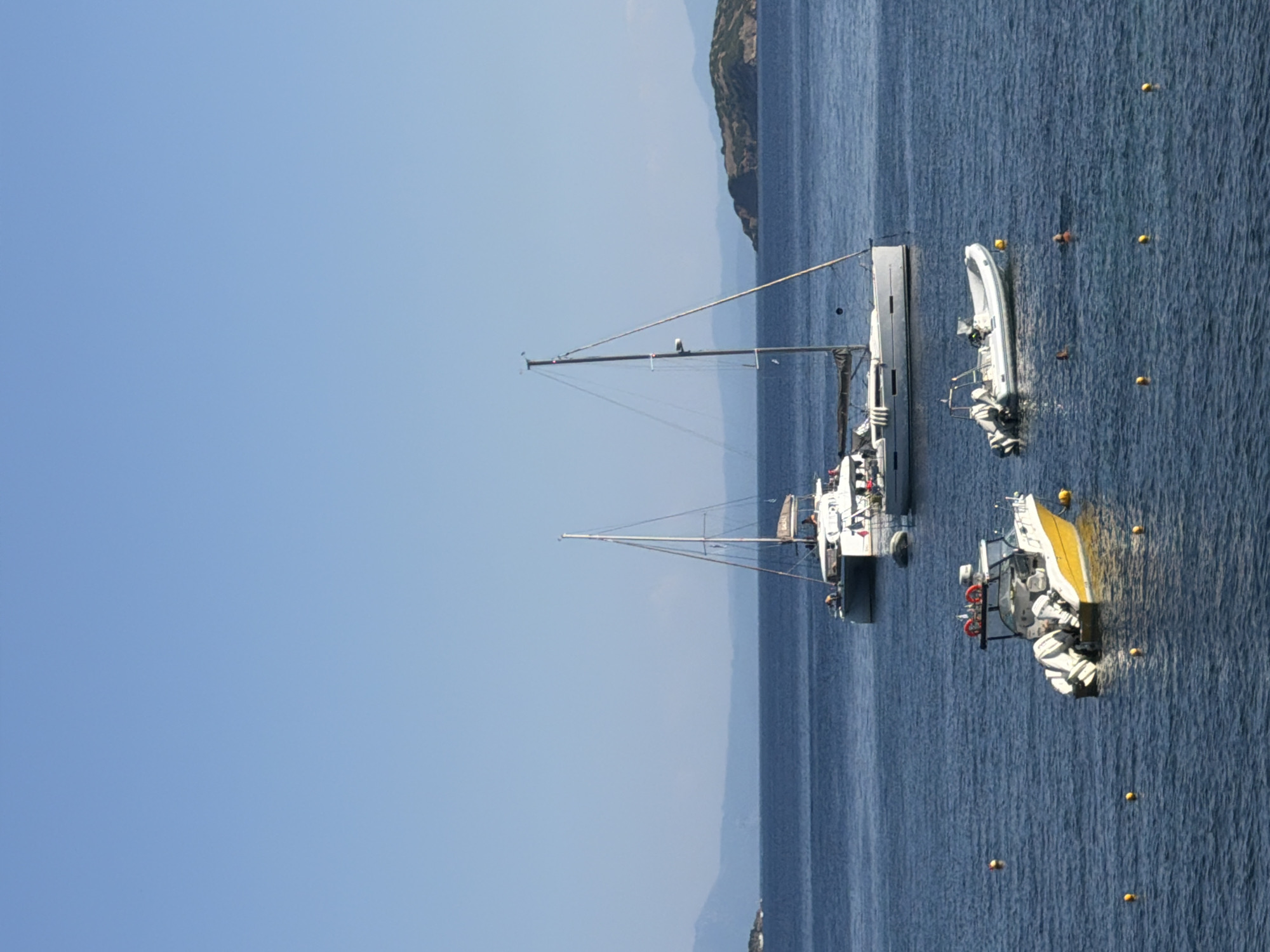 Boats anchored and beach packed on a Skiathos afternoon