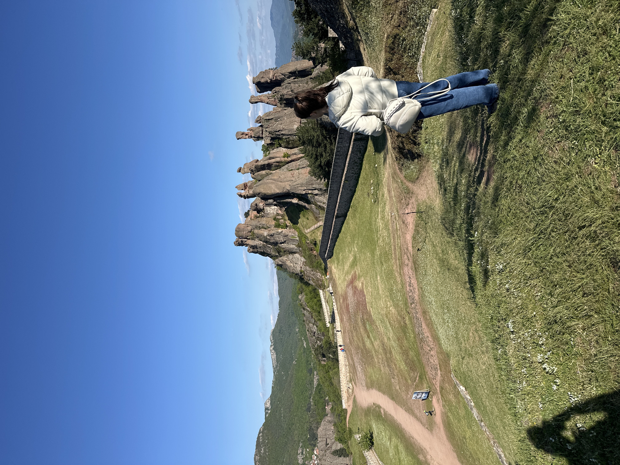 Tourist visits Belogradchik Rocks formation in Bulgaria