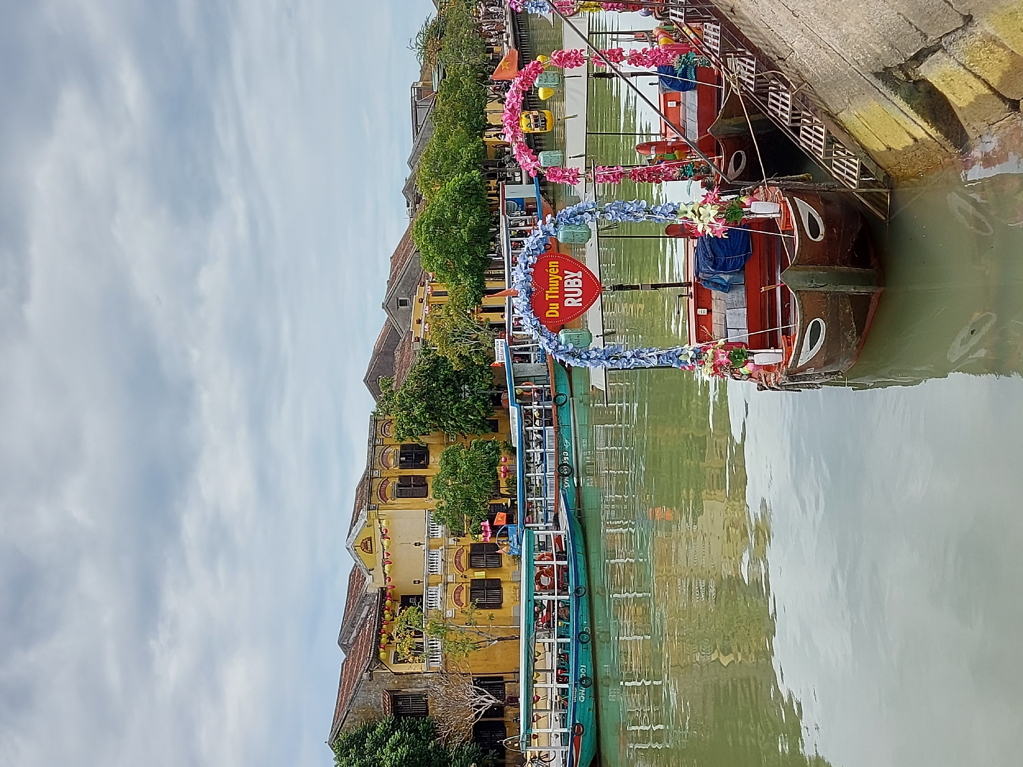 Exploring Hoi An's riverside streets, temples, and alleyways