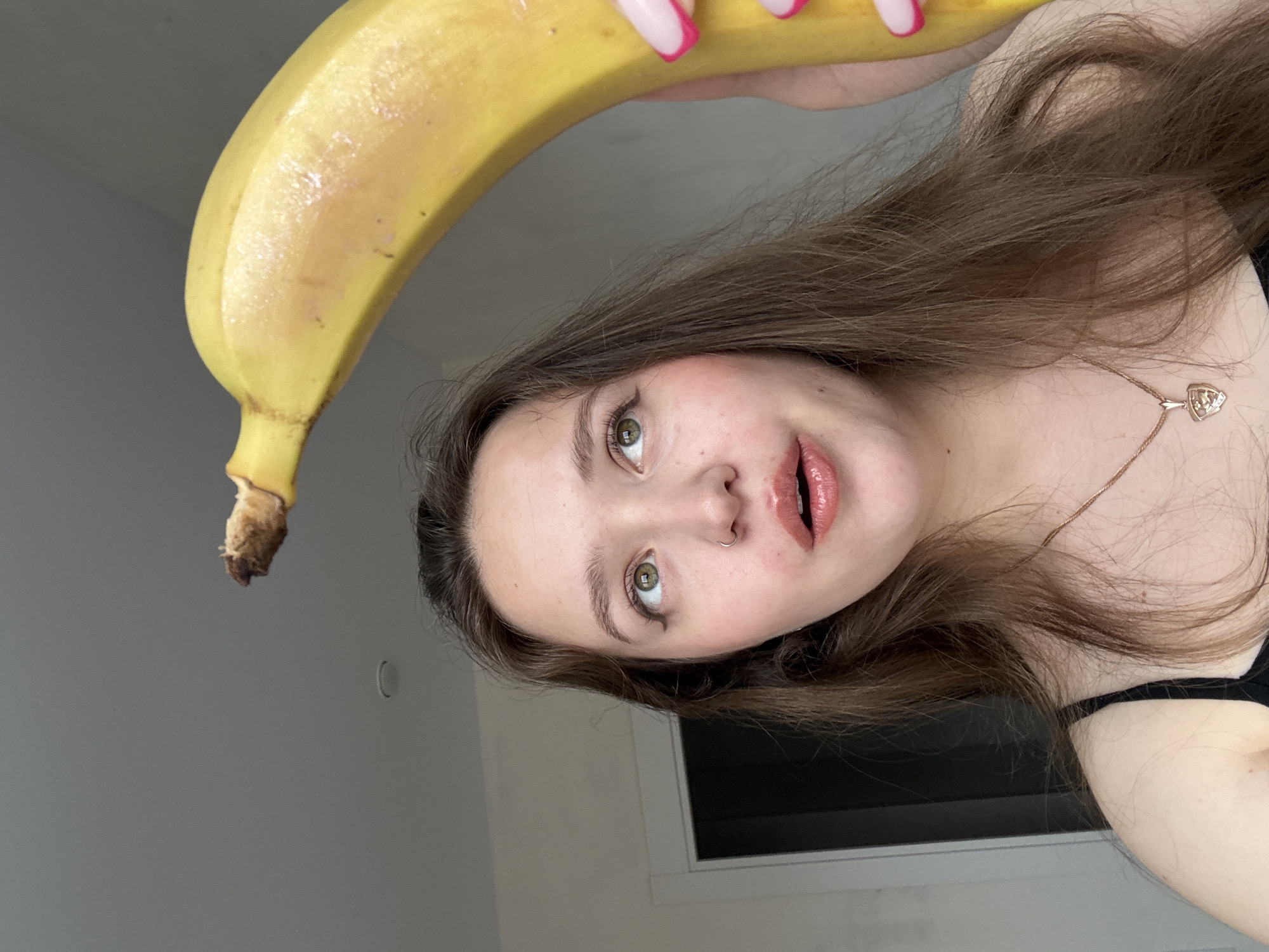 Woman poses with banana phone, takes selfies in Izhevsk