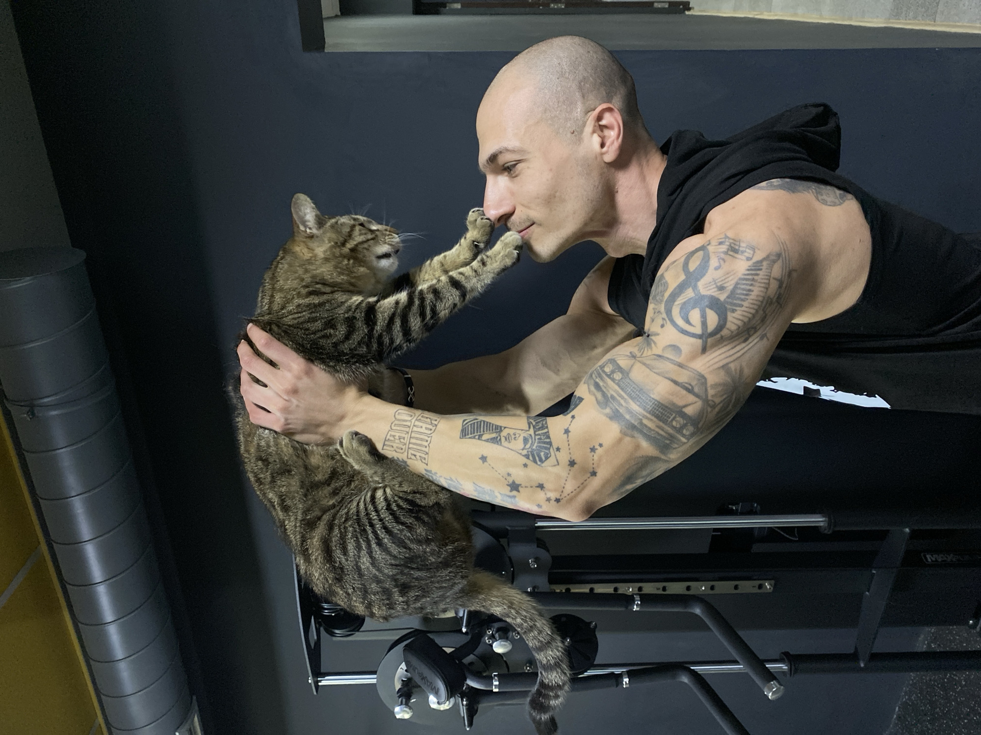 Tender cat moment and workout session captured in Pleven