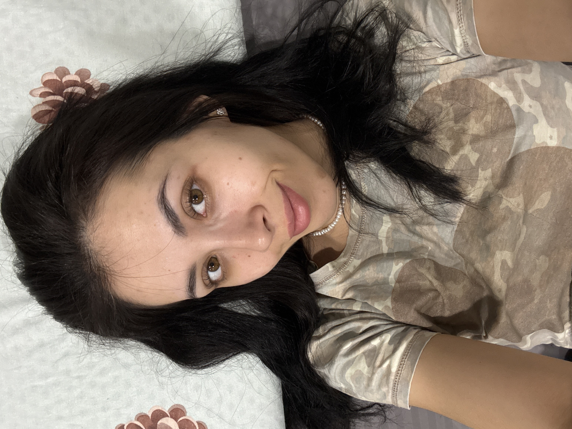 Woman rests on pillow in Votkinsk, Russia