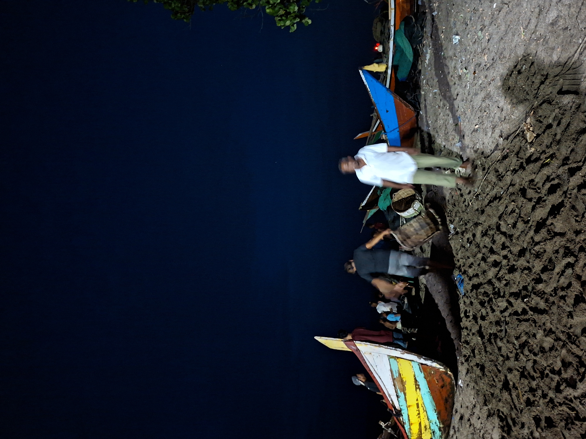 Nighttime coastal scenes captured in Lhokseumawe, Indonesia
