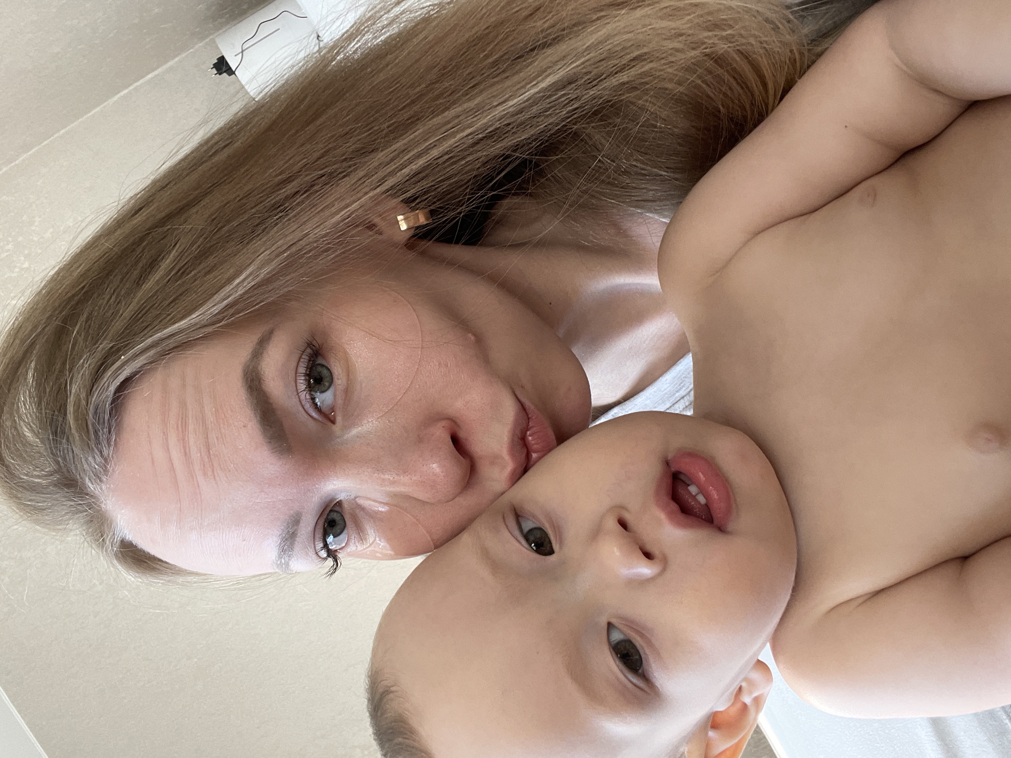 Domestic moments with woman, baby, and dog captured in Perm
