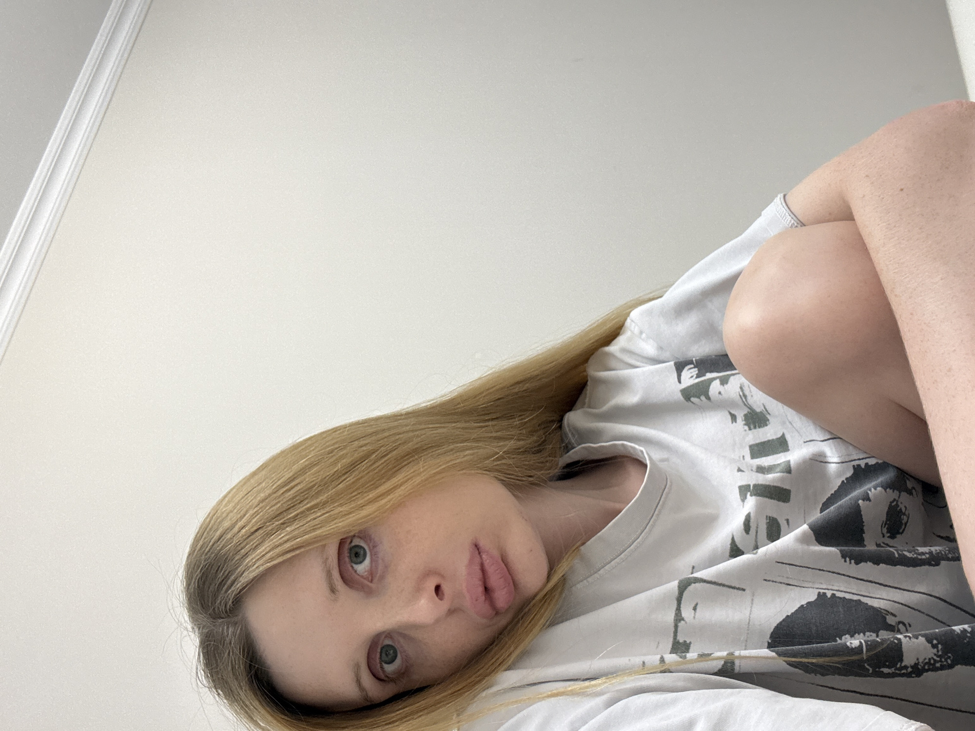 Quick selfie session, multiple angles, one graphic tee