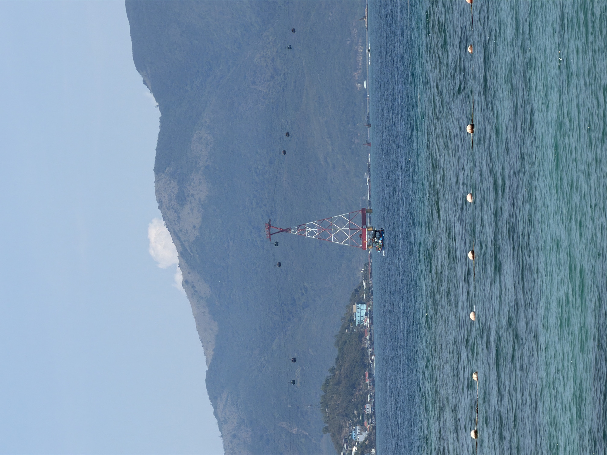 Tourist captures coastal scenes during early morning Nha Trang visit