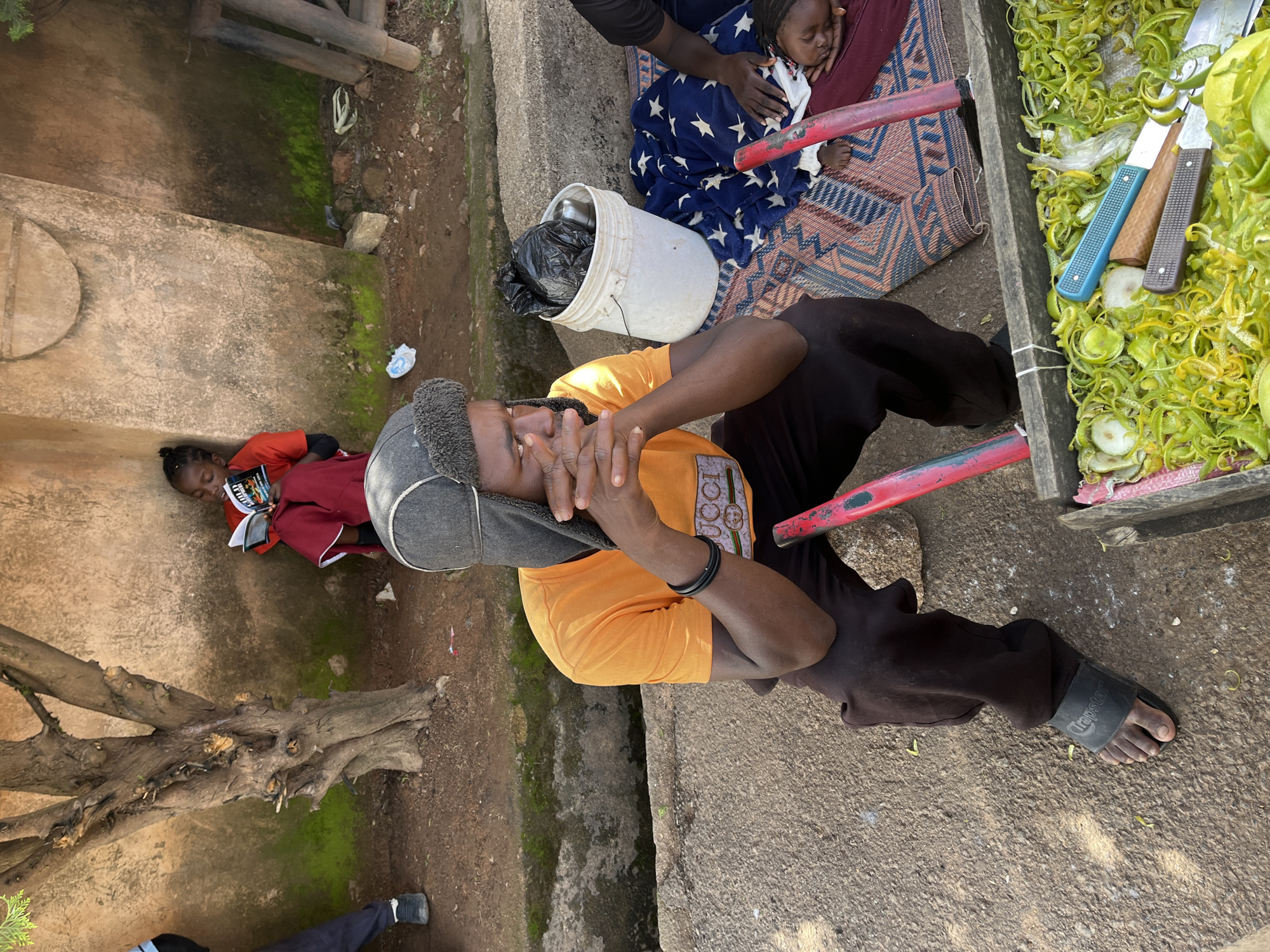 Everyday street life across two Nigerian communities, midday