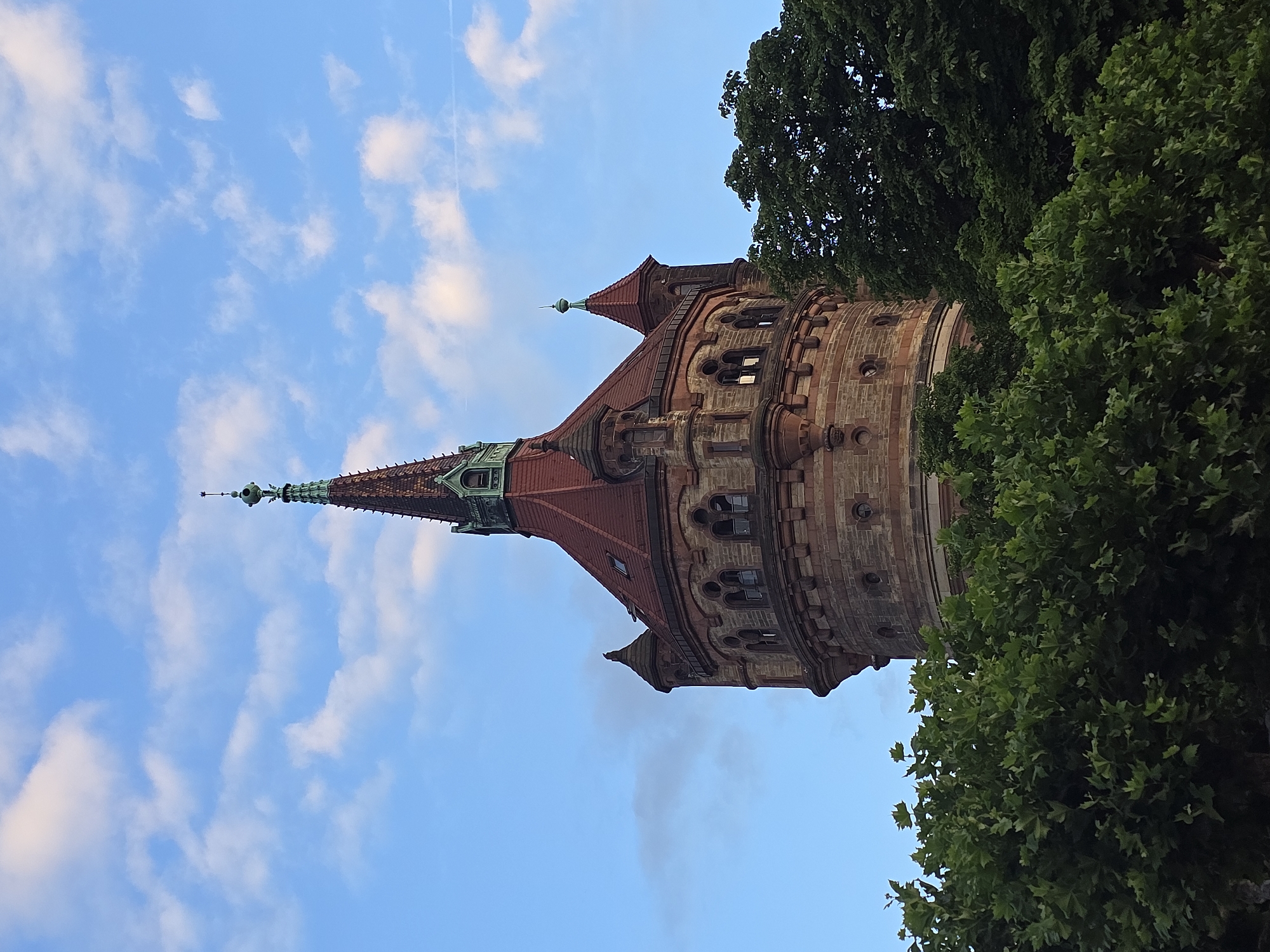 Worms Water Tower photographed from multiple angles on a summer evening