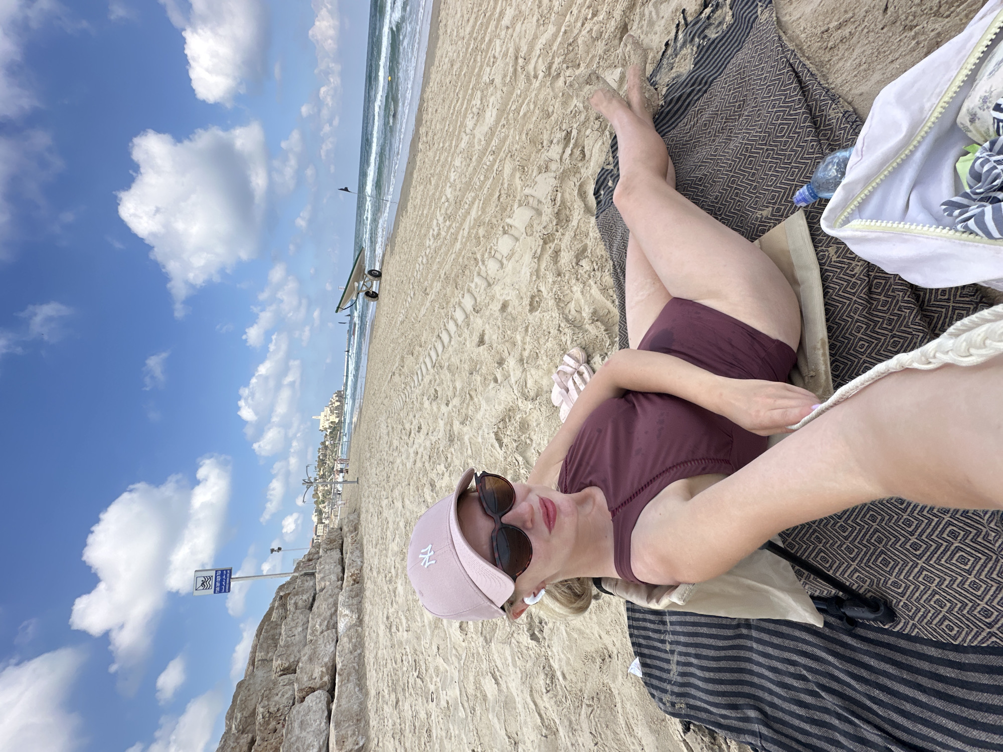 Summer morning on Tel Aviv's beach, Jaffa in the backdrop
