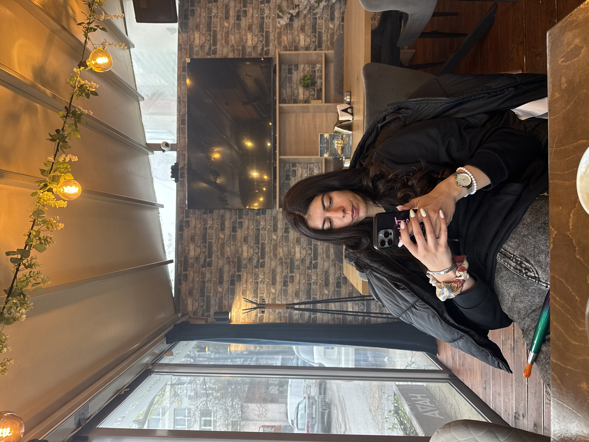 Woman spends afternoon at Sofia café reading, socializing