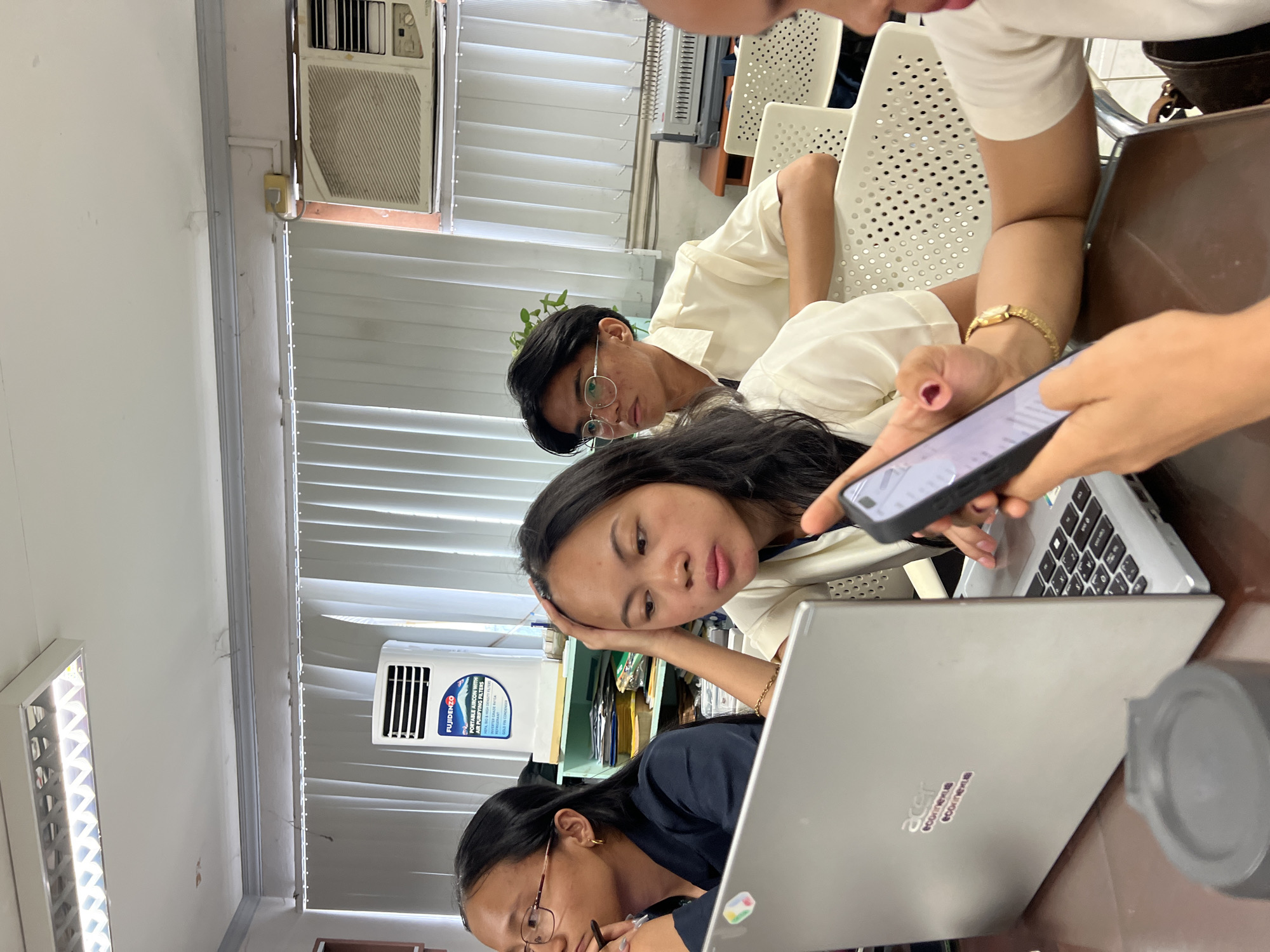 University students hang out in a Davao City office or meeting room