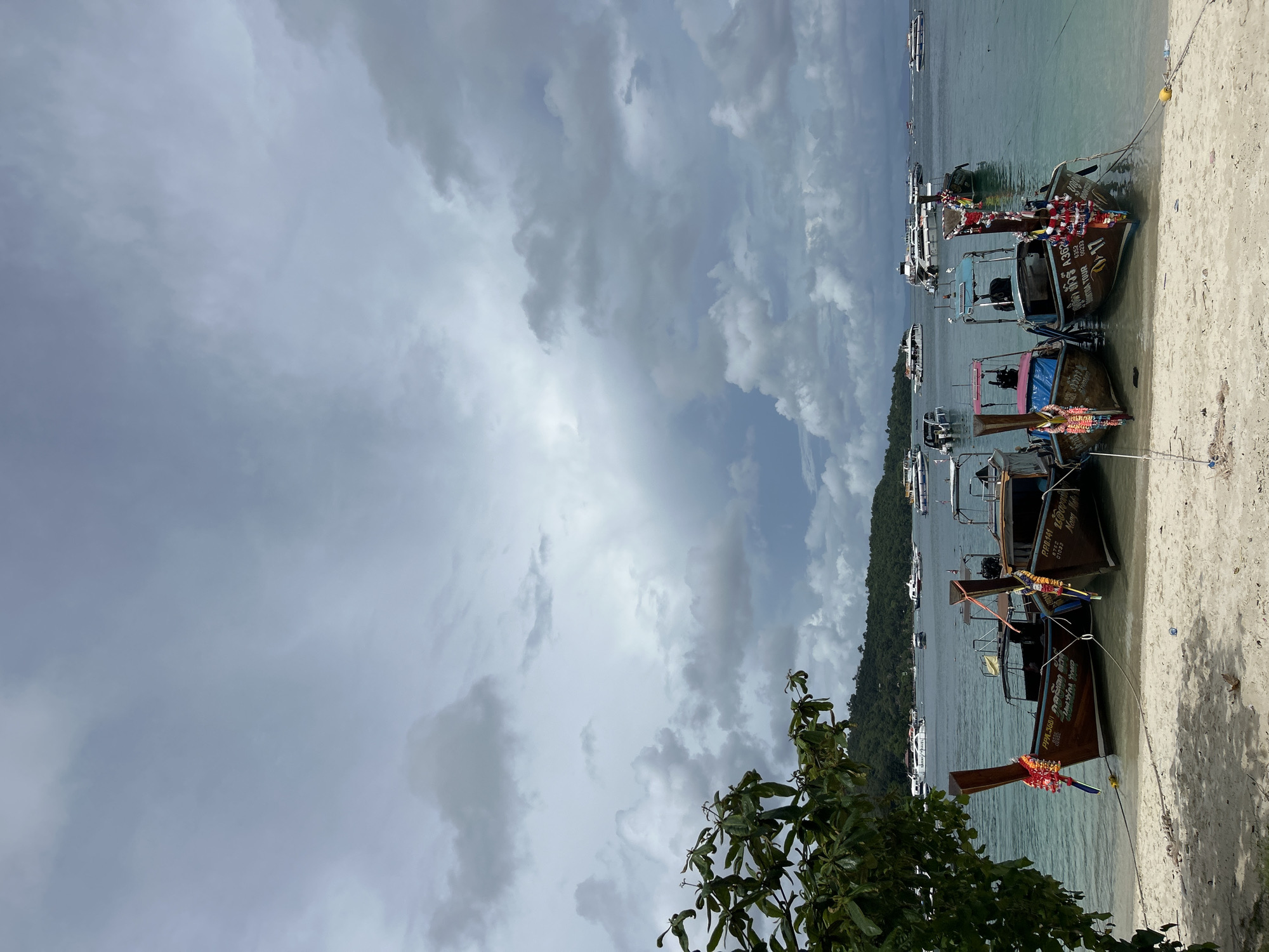 Morning beach life unfolds in Ao Nang, Thailand