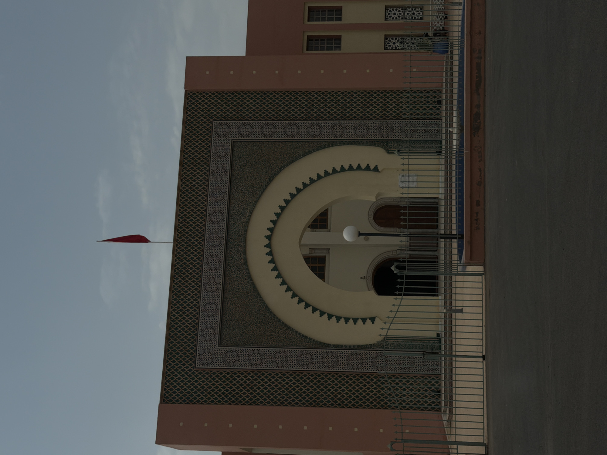 Moroccan building facade with geometric tilework, Marrakesh
