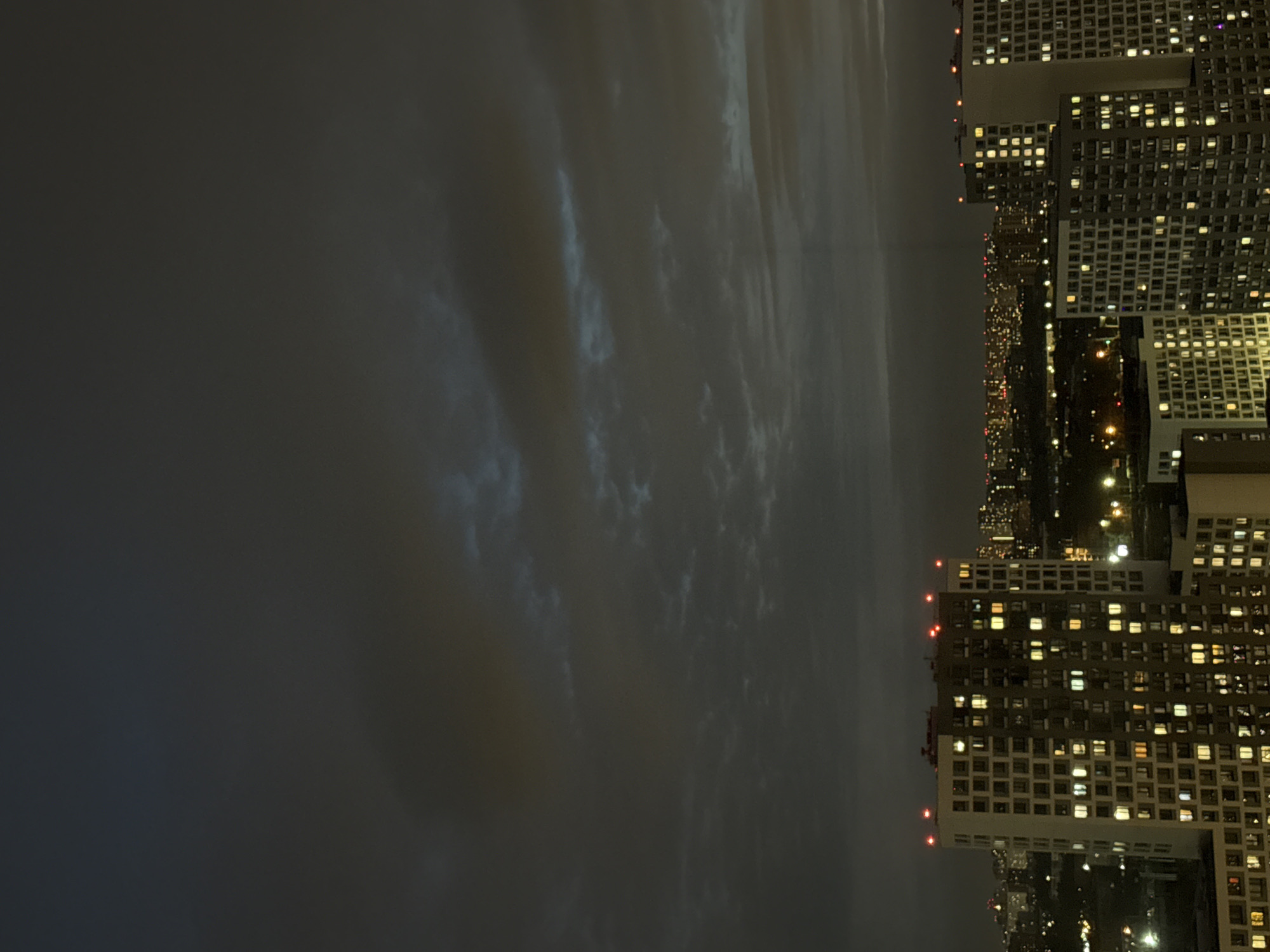 Nighttime cityscape documentation captures illuminated Lyubertsy apartment buildings