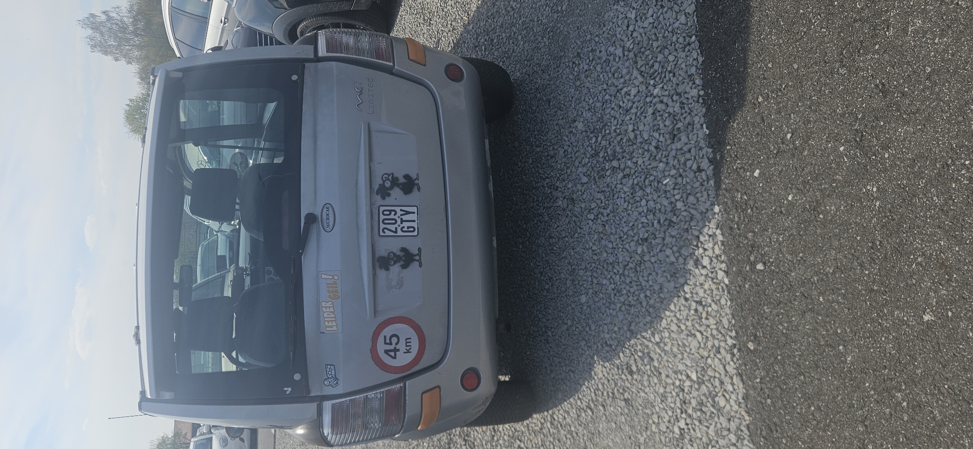 Silver microcar spotted parked in Delbrück, Germany