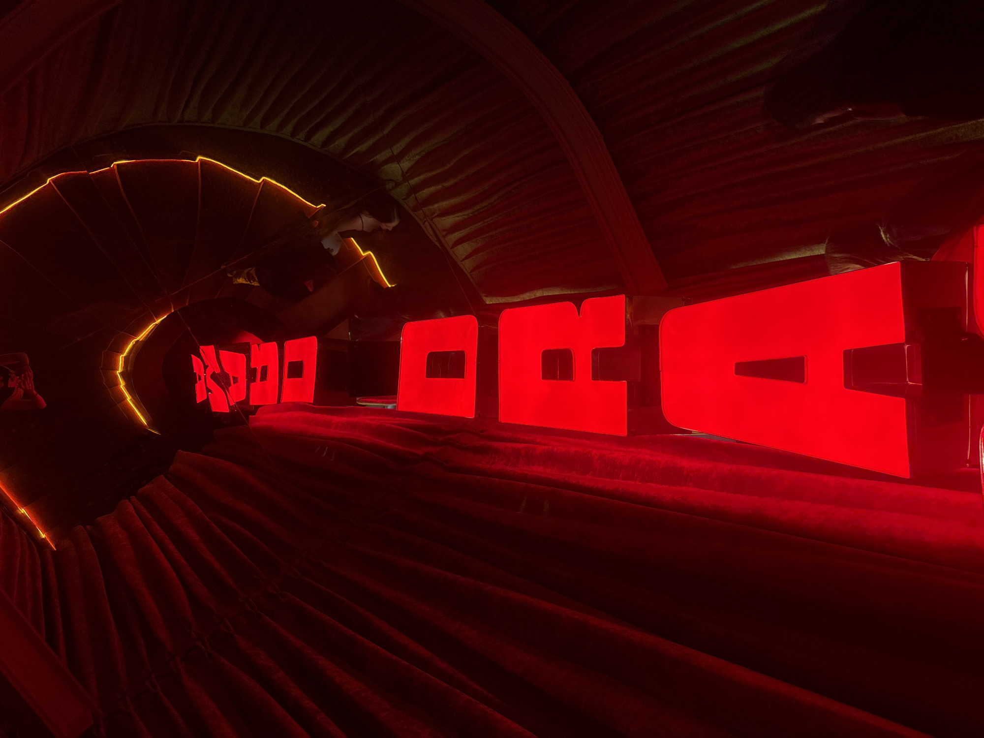 Red tunnel art installation documented in Mexico City