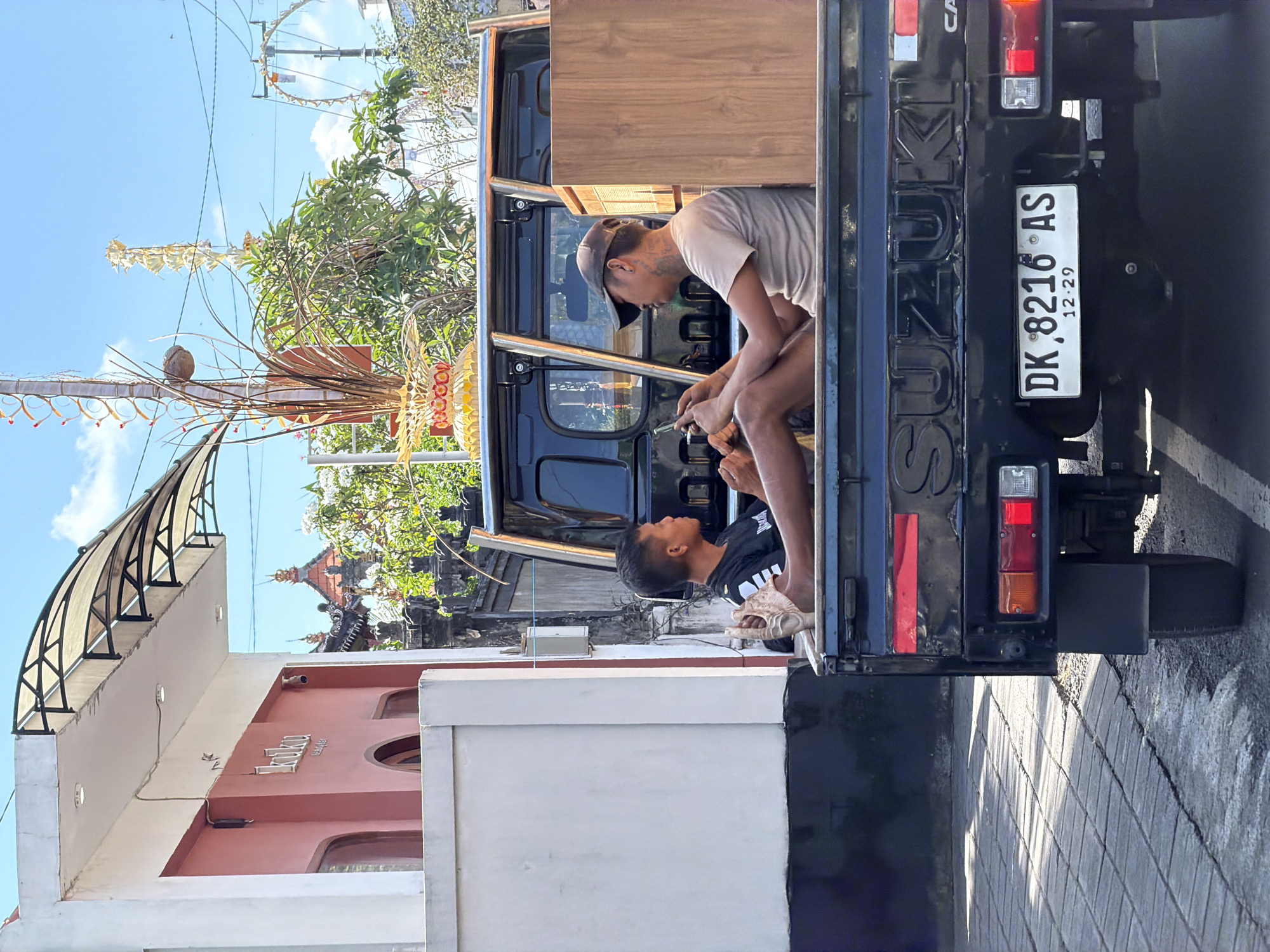 Morning street life and errands across Mengwi, Bali