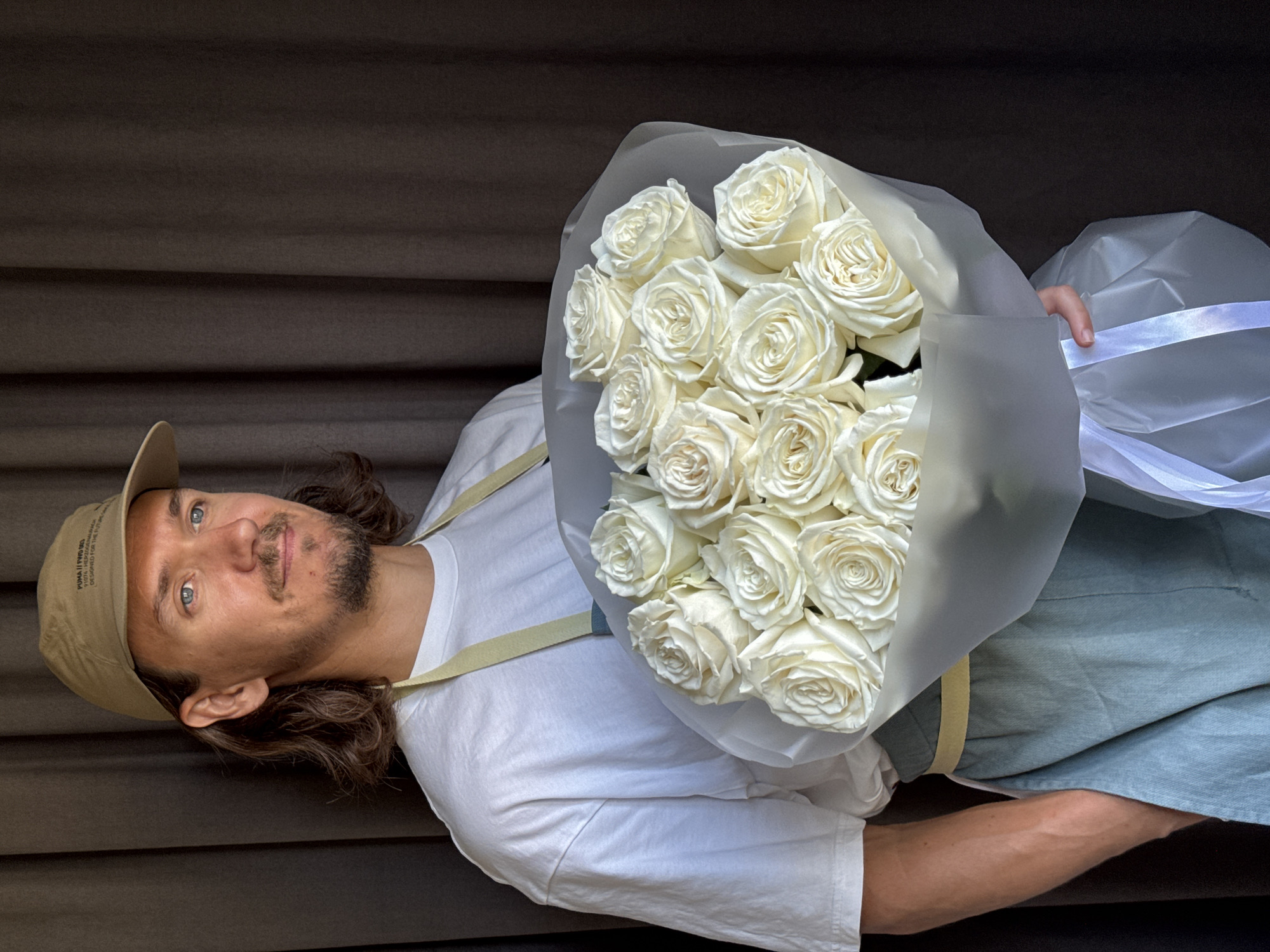 White rose bouquet on display at an Izhevsk flower stand