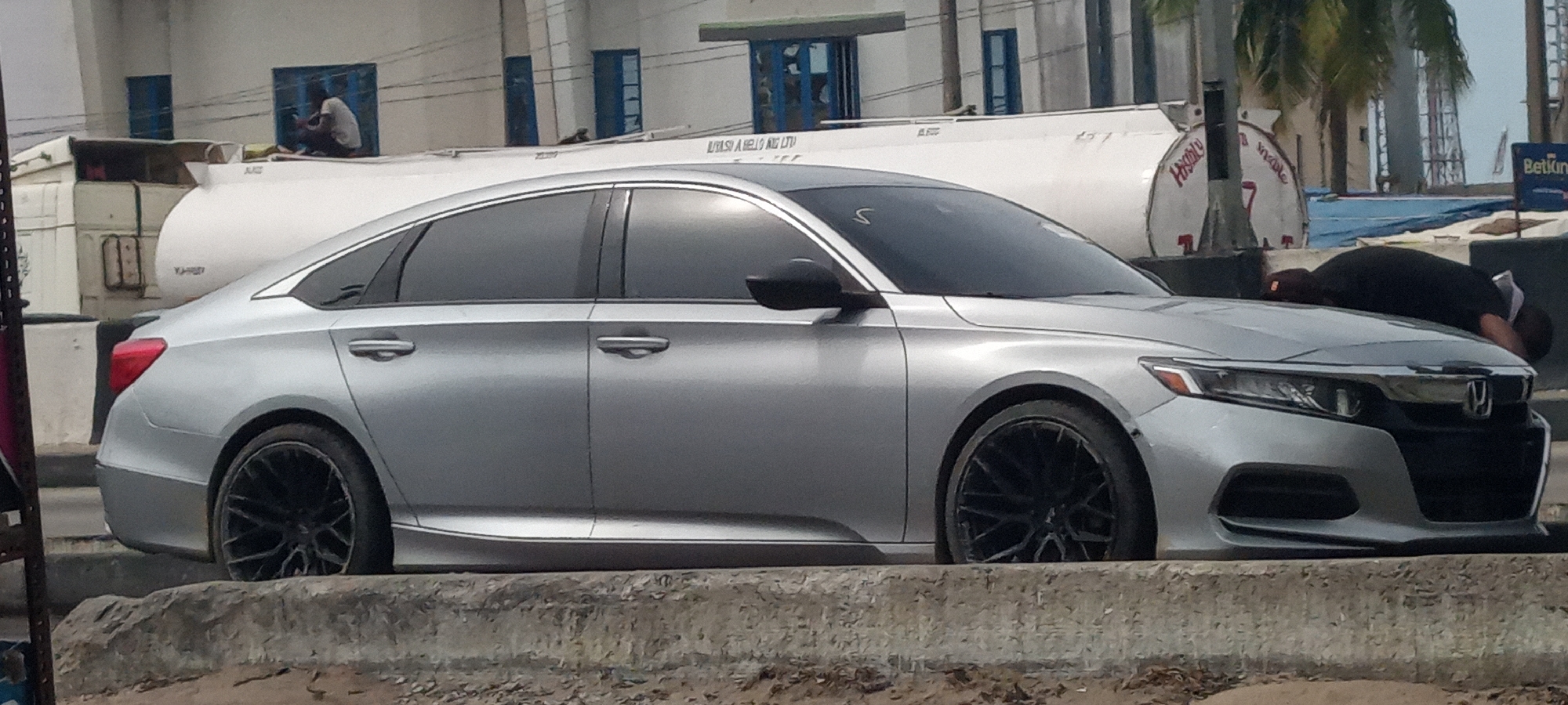Silver Honda parked with open trunk in Alaiyabiagba, Nigeria
