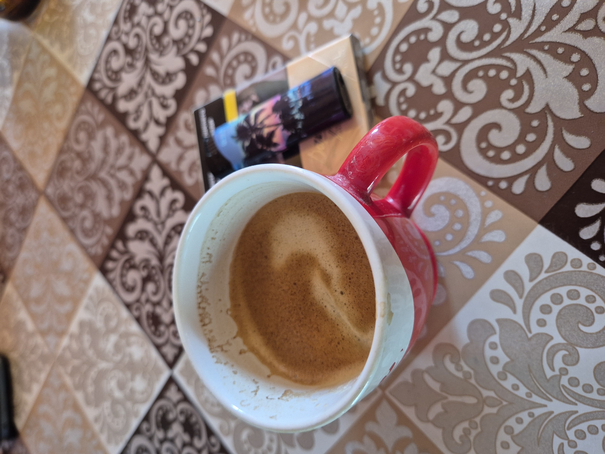 Coffee, a chihuahua, and garden gnomes on a quiet morning