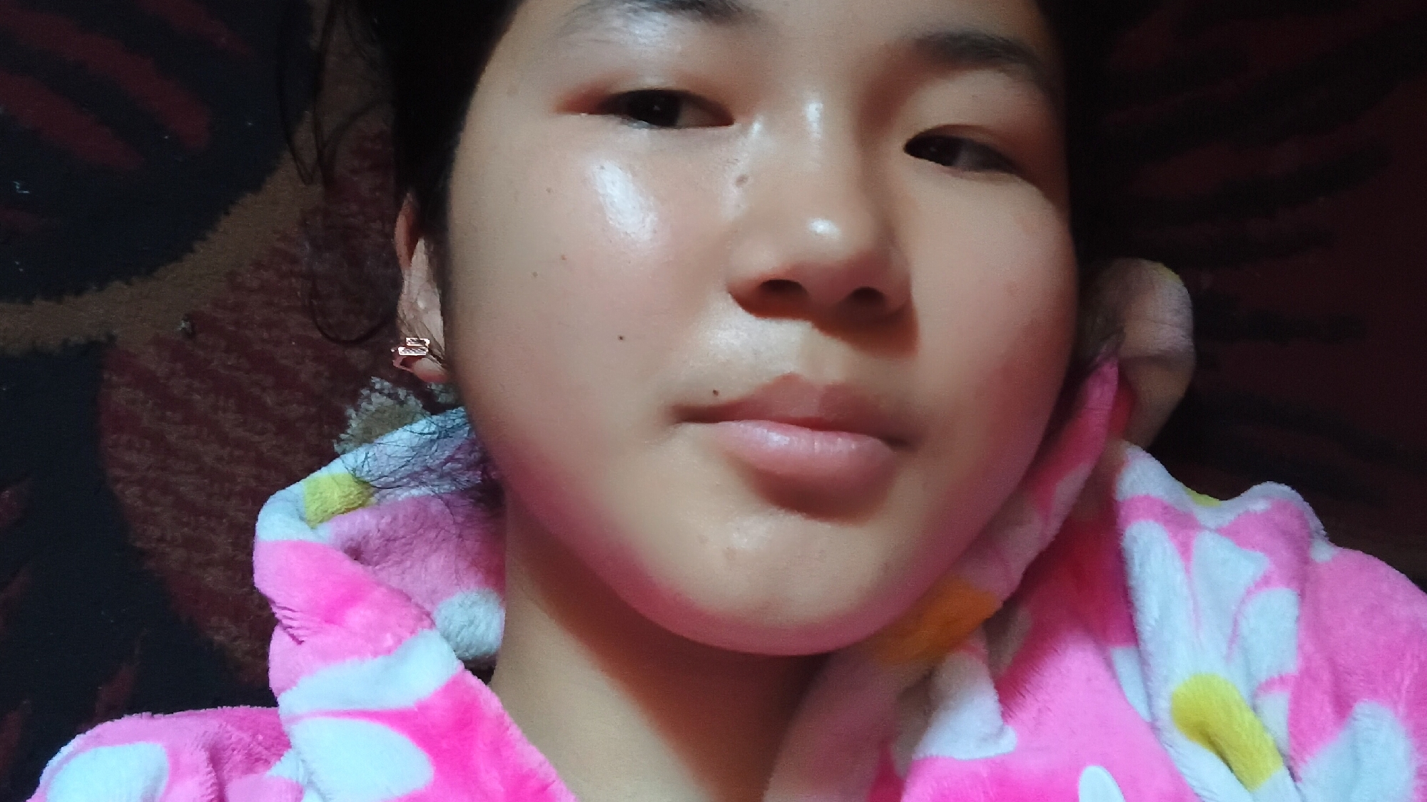 Late-night selfie session with a flip phone in Uchkun