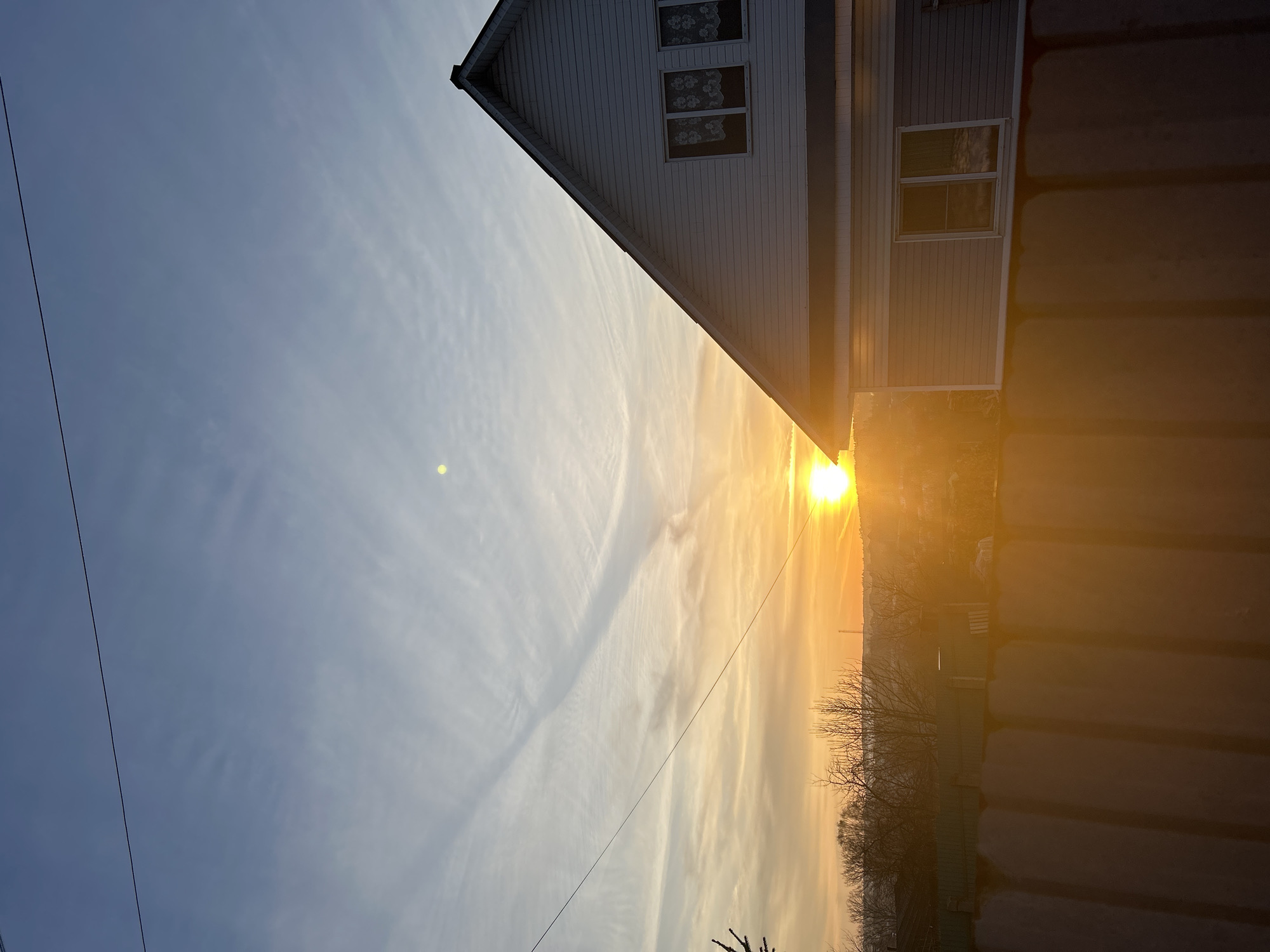 Woman and child travel by car during sunrise in Russia