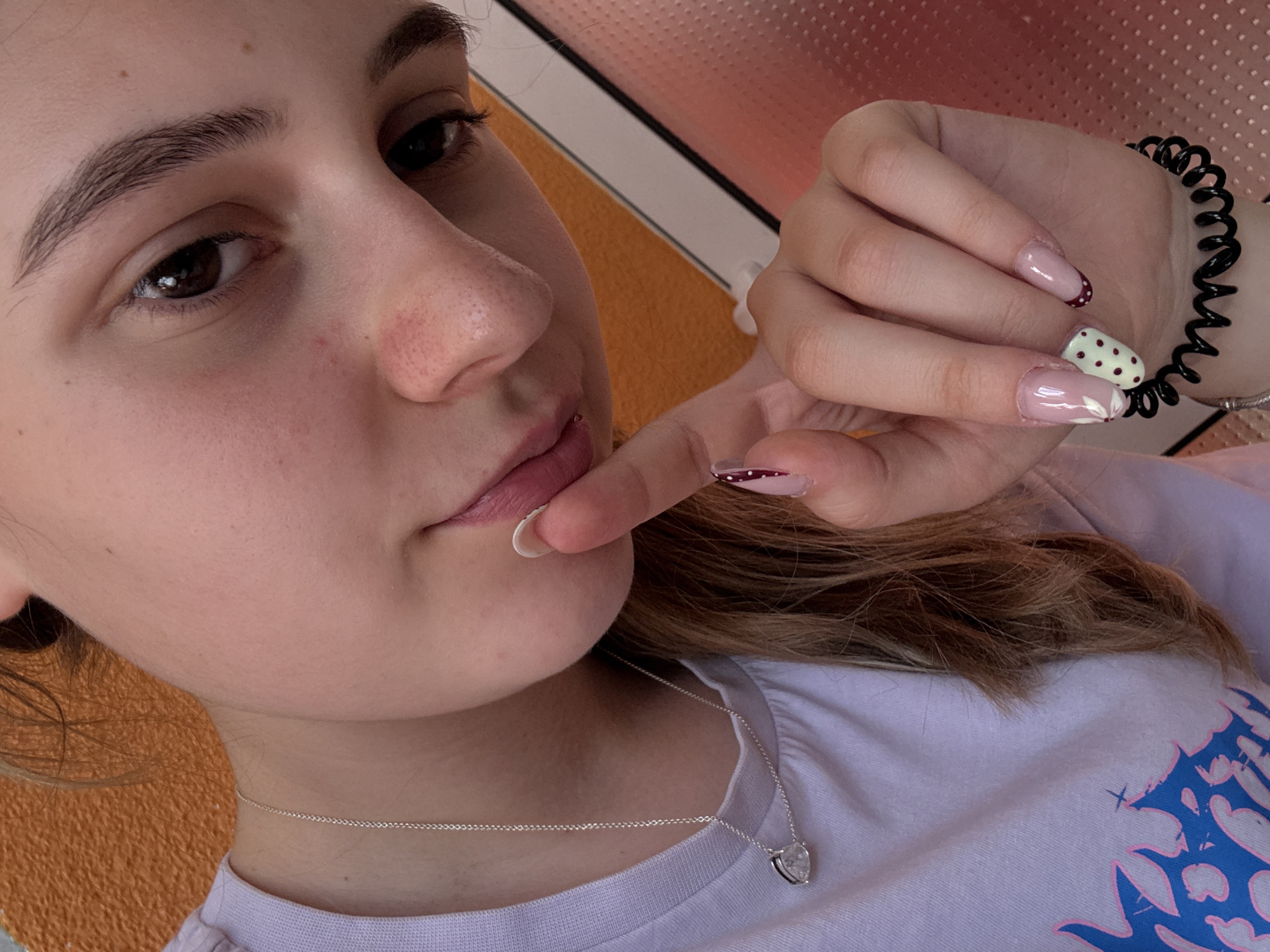 Student documents biology study session with selfies and cherries