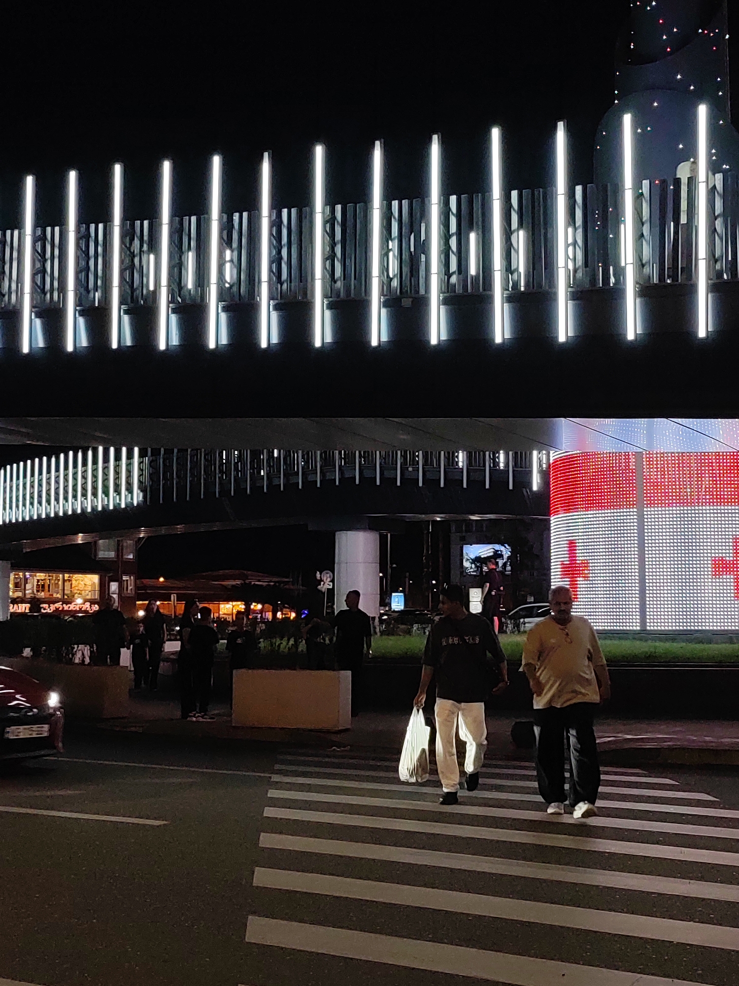 Batumi's seafront lights up on a busy summer evening