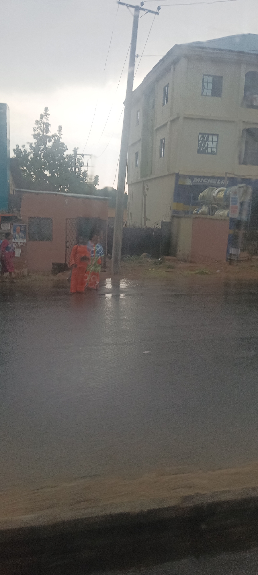 Rainy afternoon street scenes documented across Jos, Nigeria