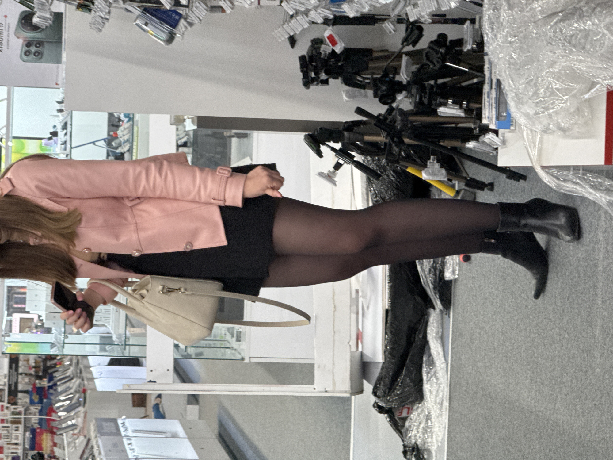 Woman shops for photography equipment in Sofia store