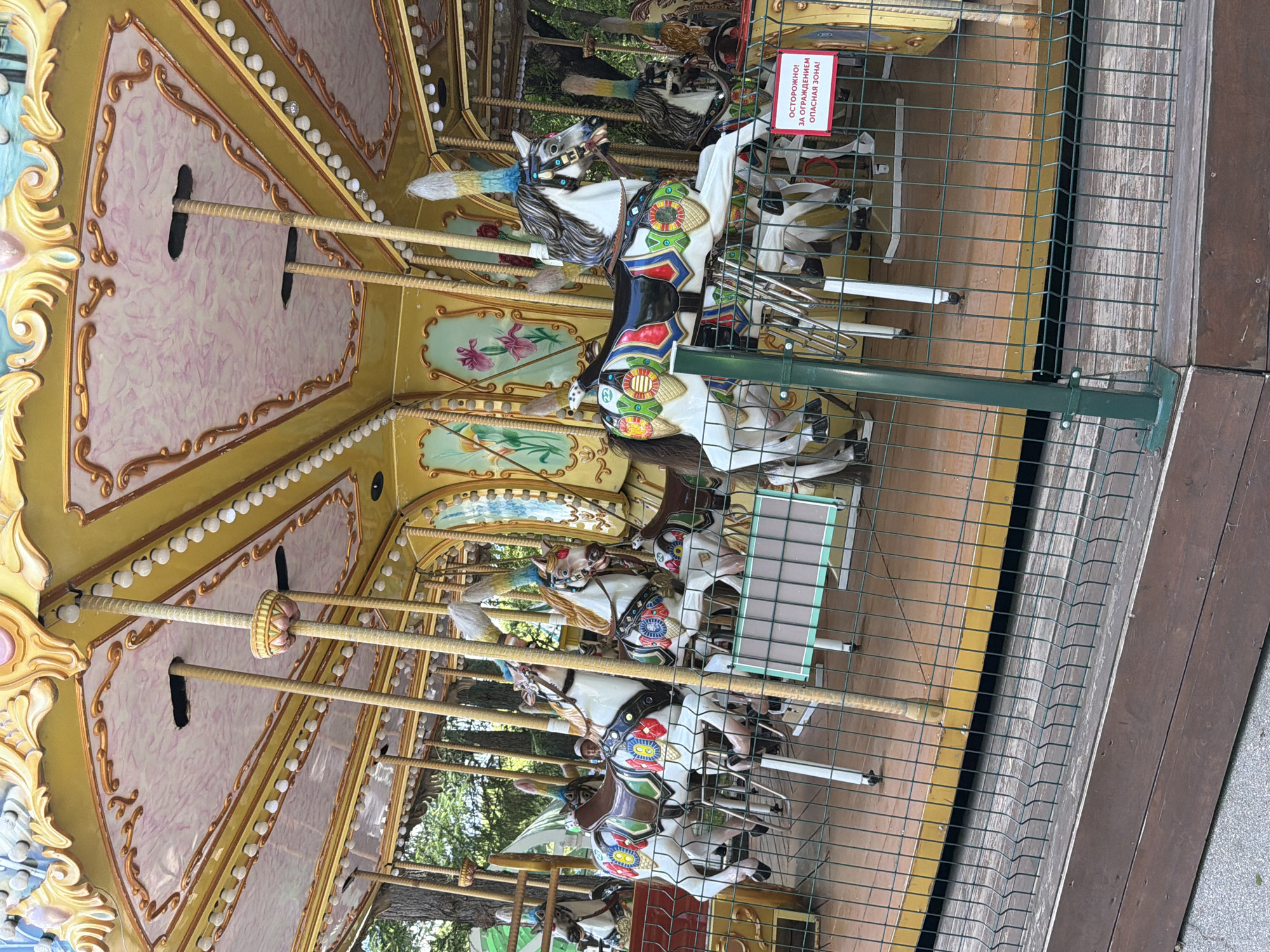 Amusement park in full swing on a summer morning in Perm