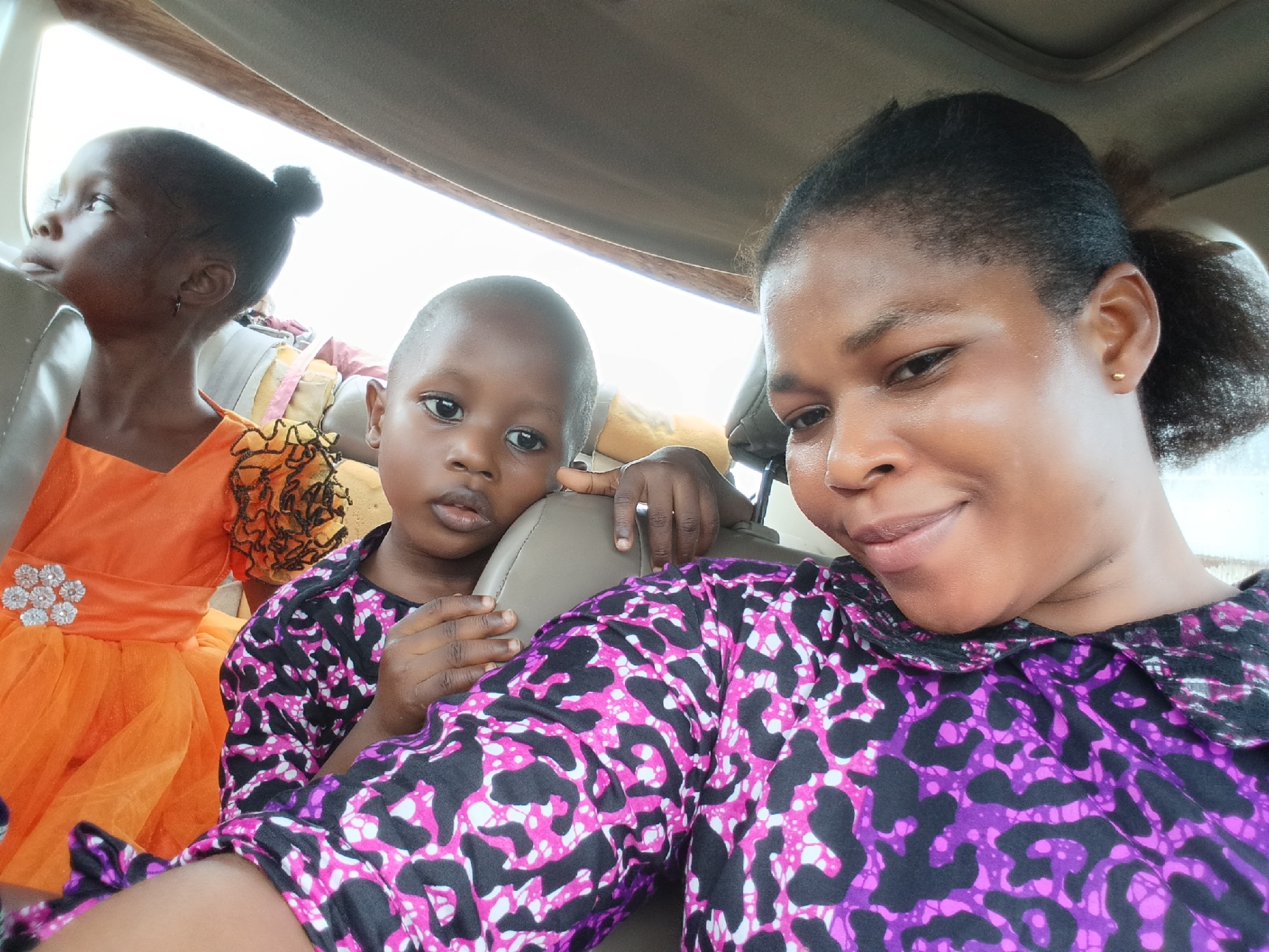 Rainy day car ride through Yenagoa, selfies and all