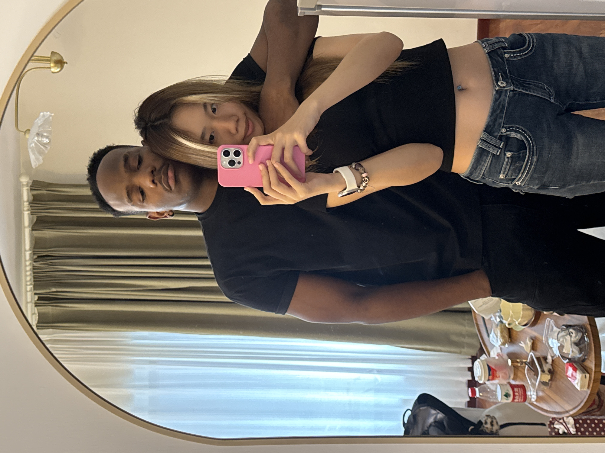Couple Takes Mirror Selfies in Yuzhong District Room