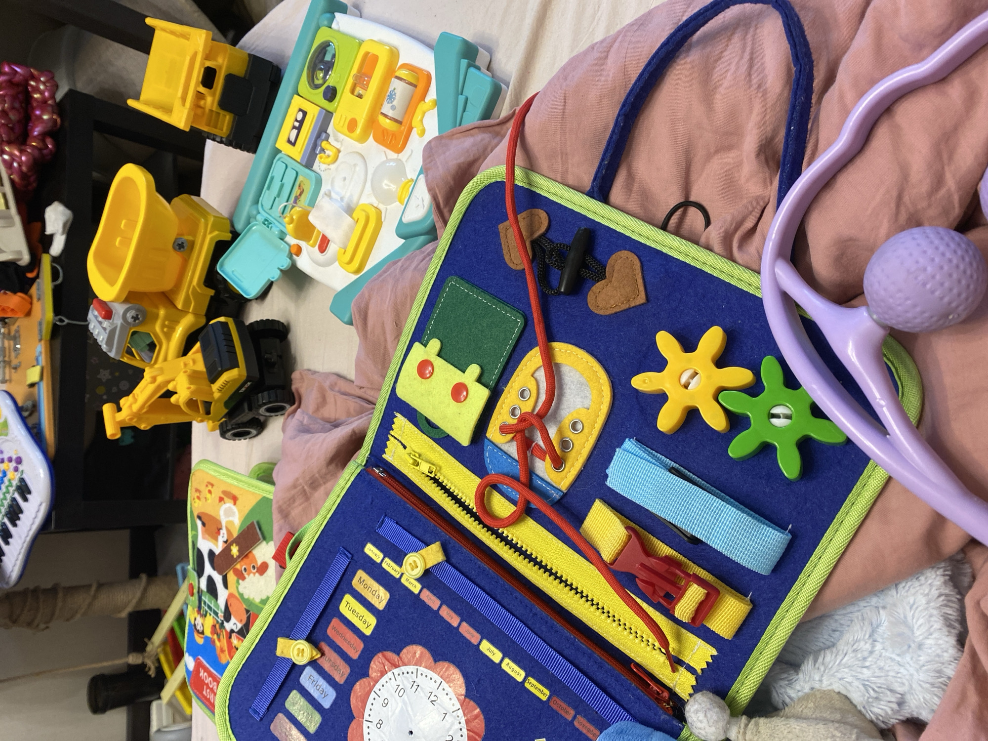 Close-up look at a kids' busy board and RC rally car