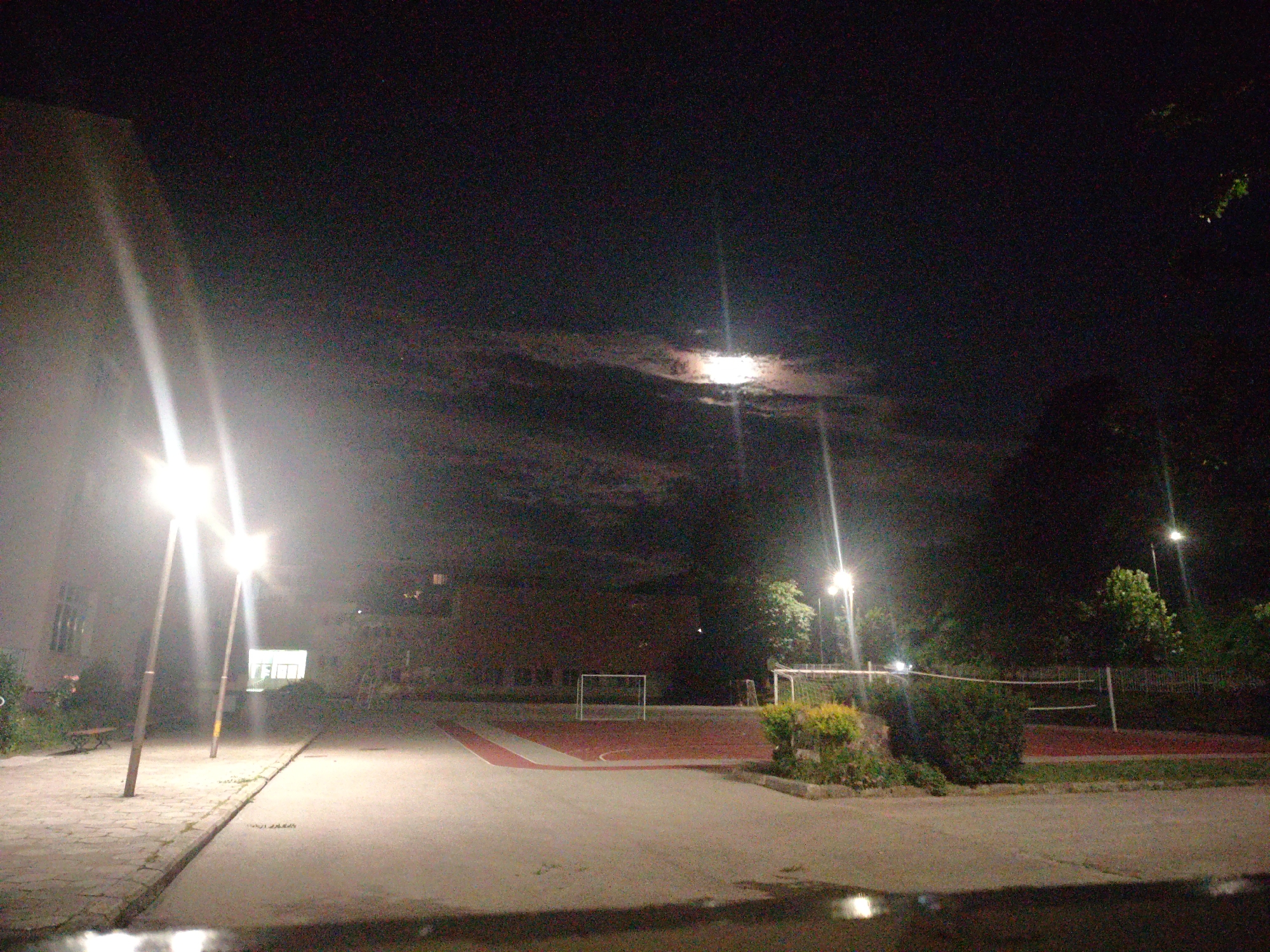 Gabrovo after dark: parks, roads, and a hazy moon