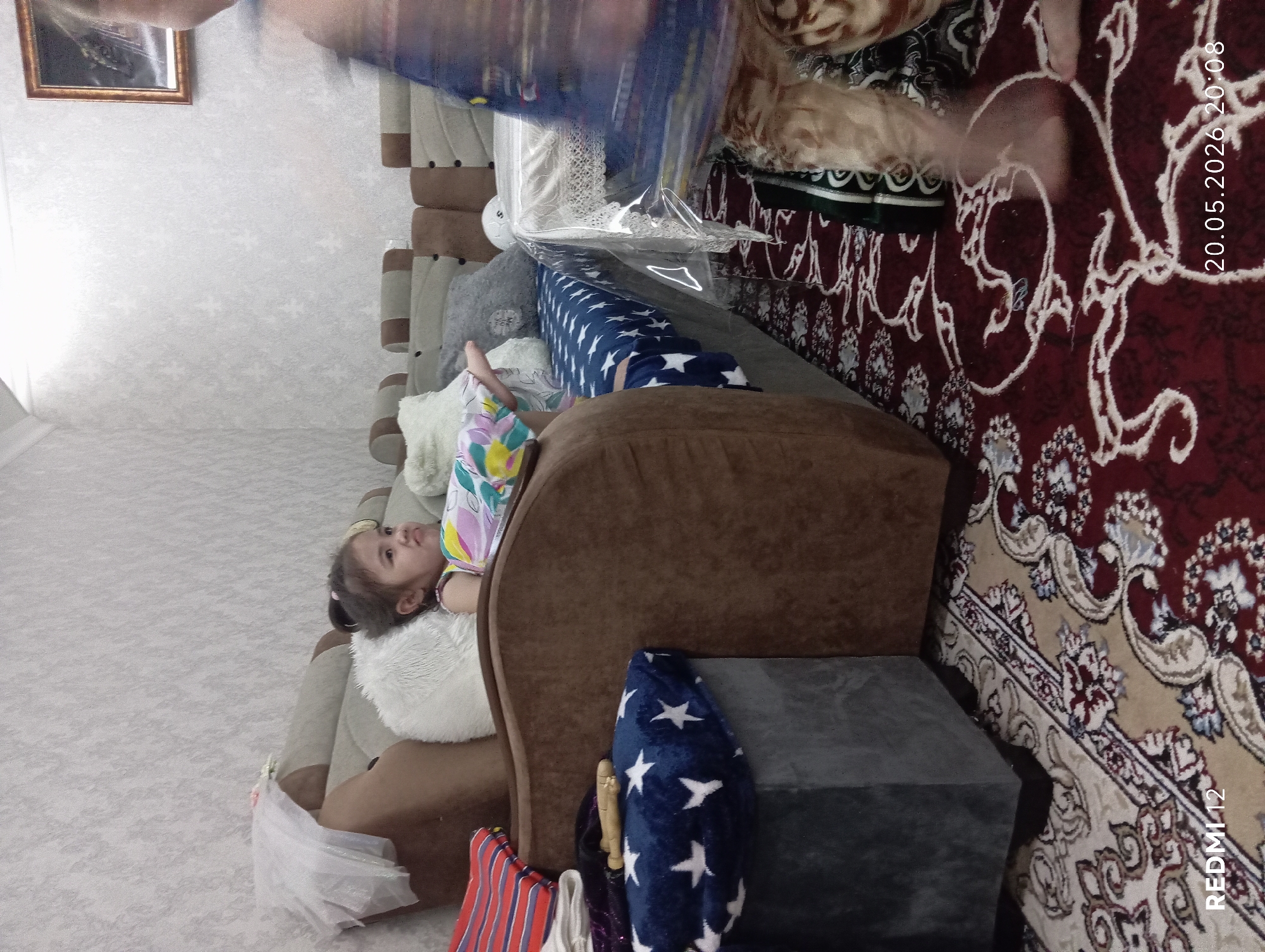 Children play and dance at home in Bekabad, Uzbekistan